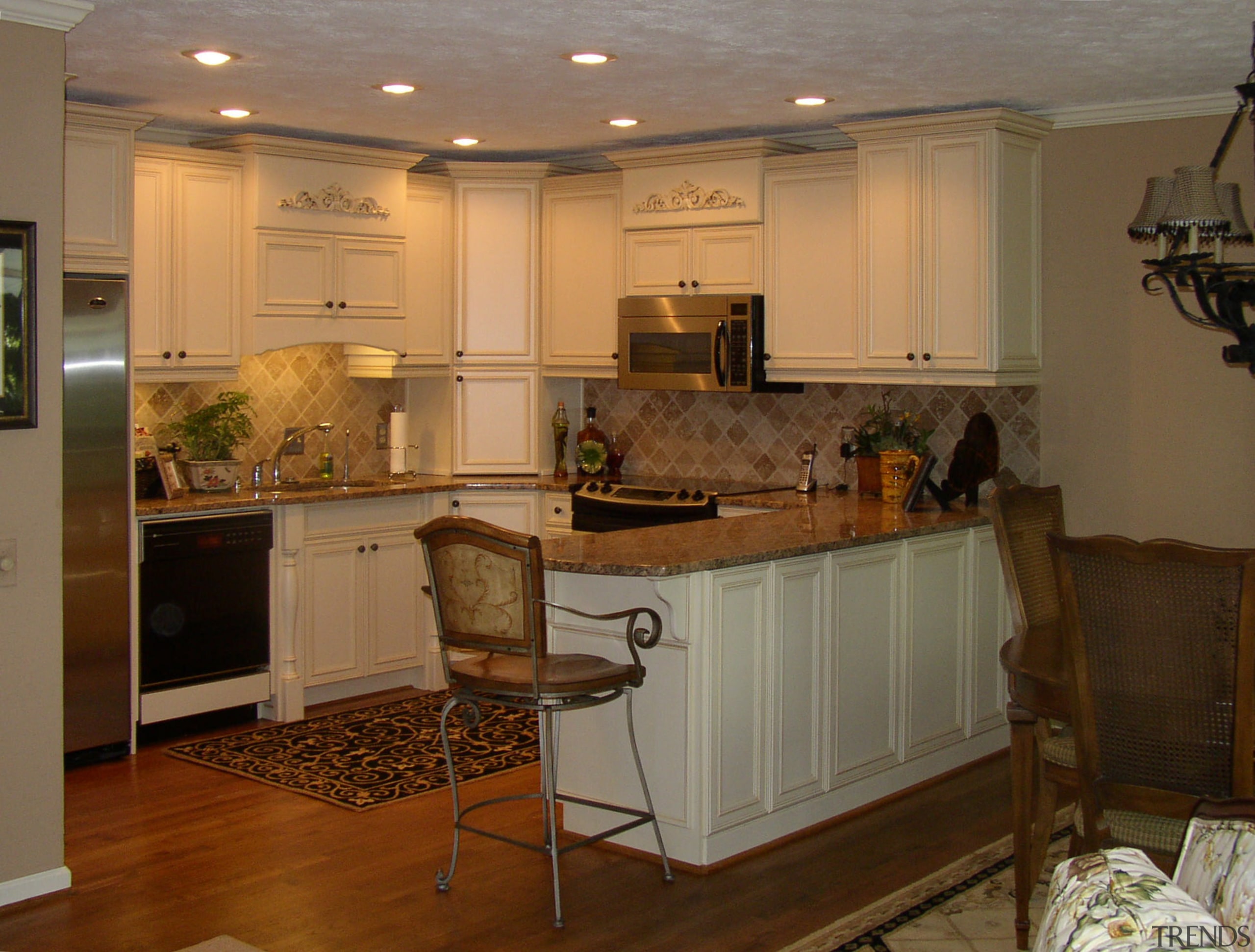 White kitchen with timber benchtops and floors - cabinetry, countertop, cuisine classique, flooring, interior design, kitchen, room, under cabinet lighting, brown