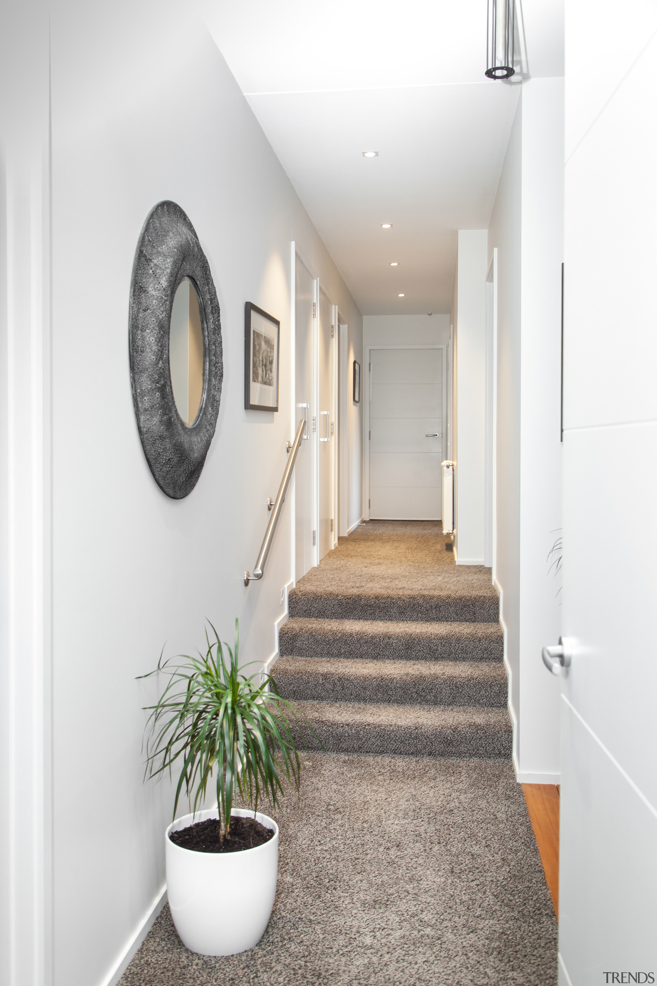 From this homes side entry, the interior steps ceiling, floor, flooring, home, interior design, wall, white