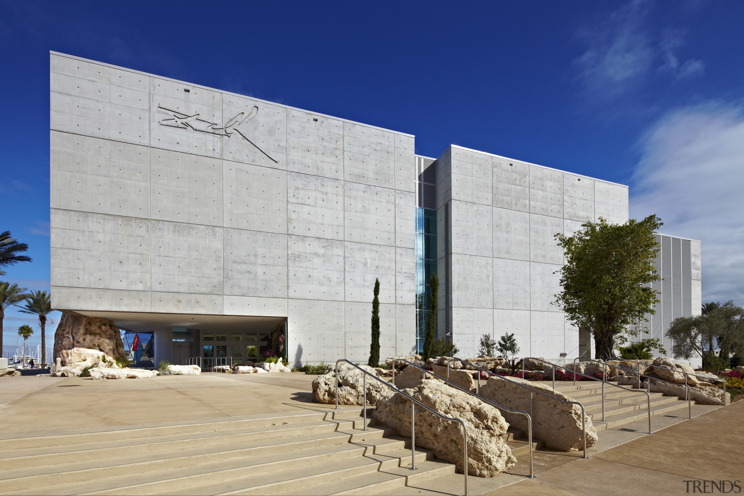 View of new art museum designed to house architecture, building, commercial building, corporate headquarters, daytime, facade, headquarters, landmark, sky, structure, tourist attraction, gray, blue