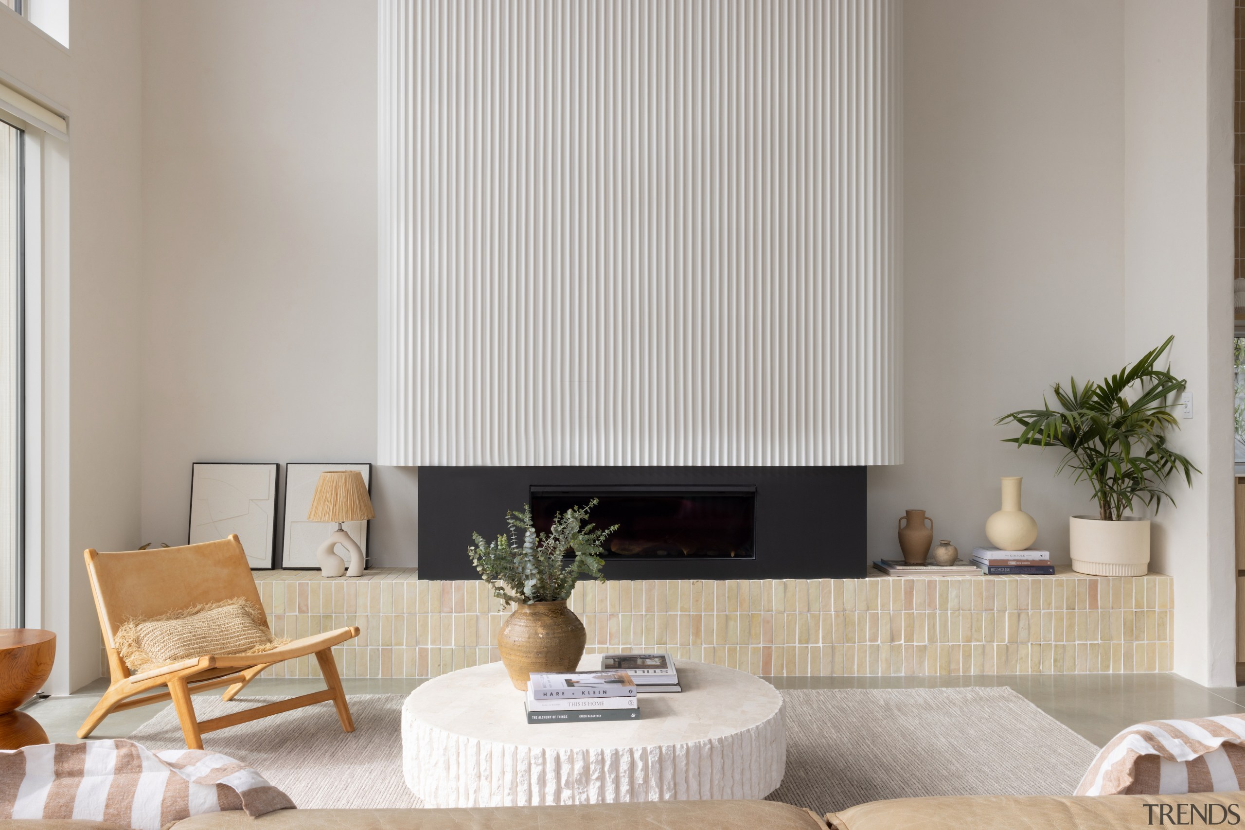 Fluting on the fireplace echoes a similar finish 