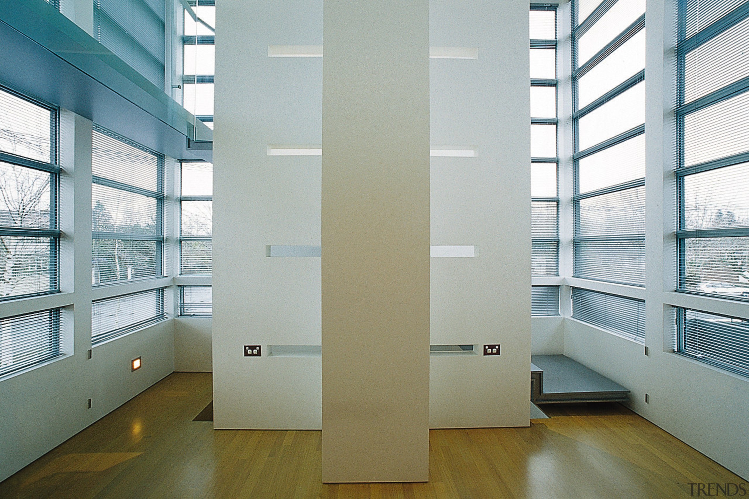 An interior view of the living areas featuring architecture, ceiling, daylighting, floor, glass, interior design, structure, window, gray