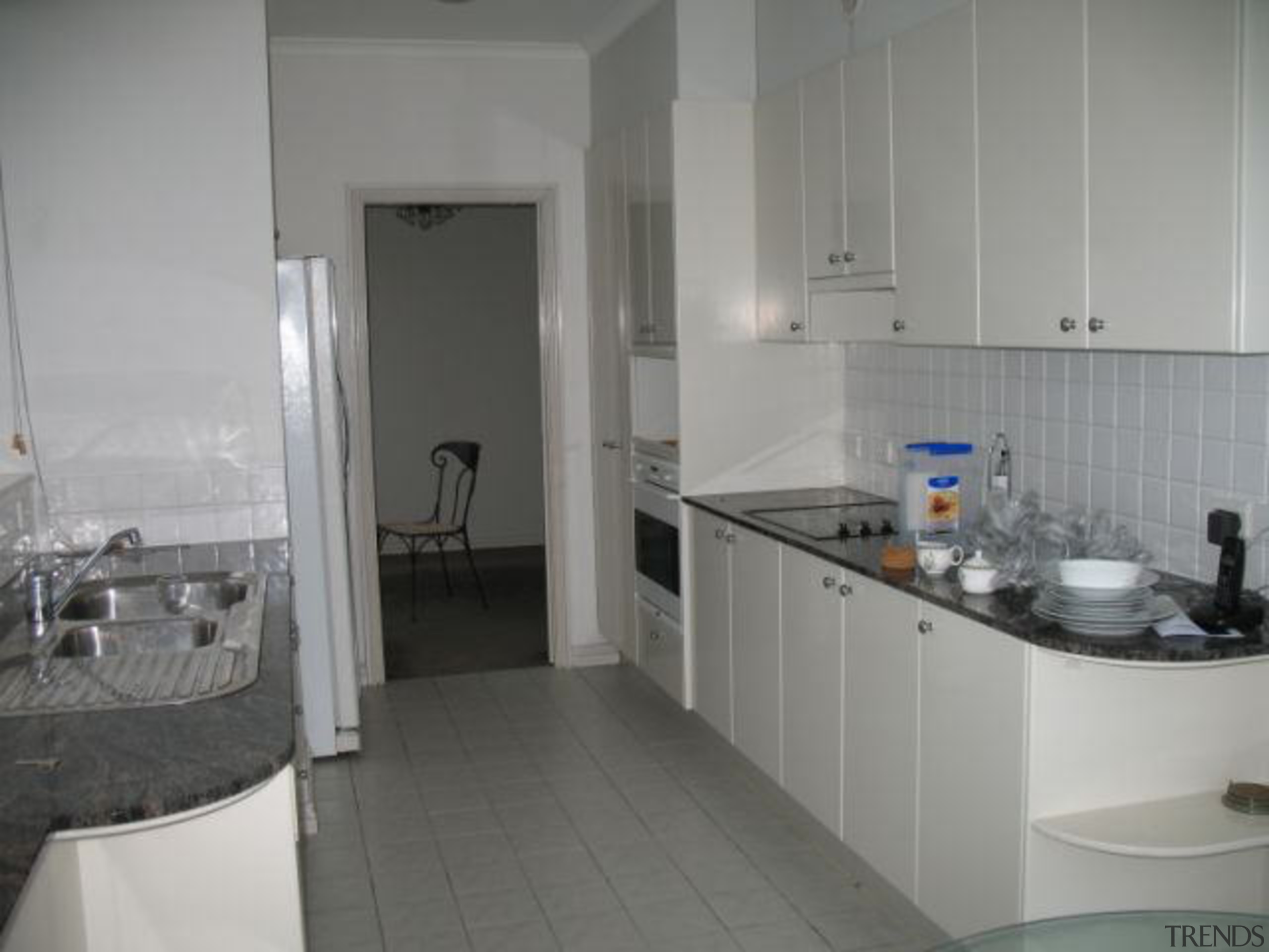 before makeover small space with lots of white bathroom, countertop, floor, flooring, kitchen, property, room, sink, tile, gray