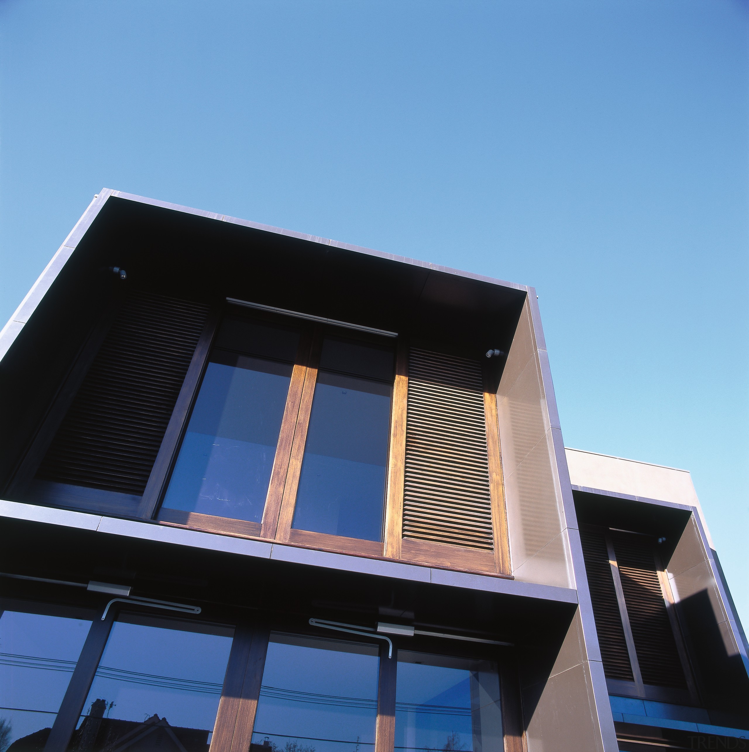 View of the shutters - View of the architecture, building, commercial building, corporate headquarters, daylighting, daytime, facade, house, roof, sky, window, teal, black