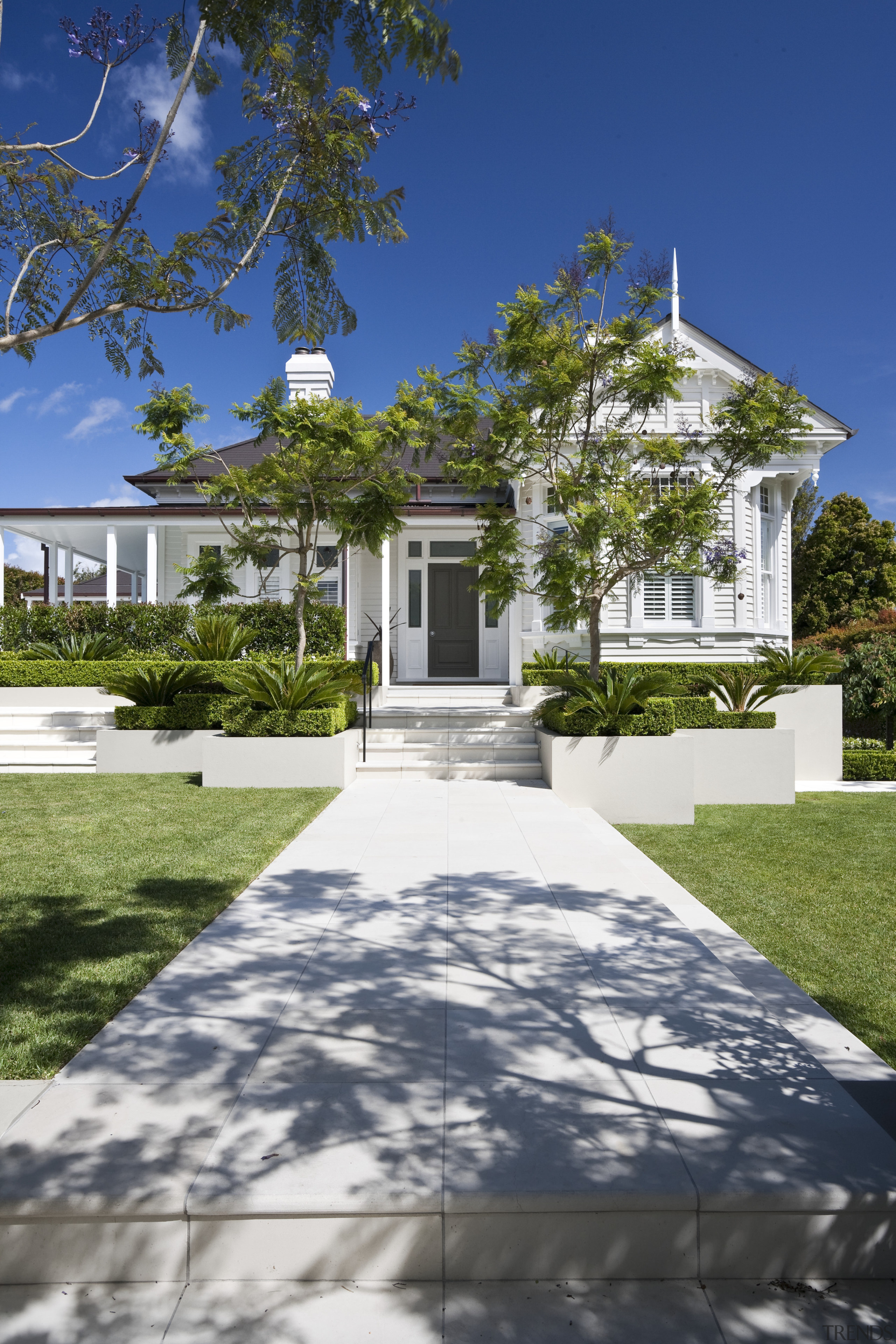 View of pool and garden designed by Humphreys architecture, daytime, estate, facade, home, house, mansion, property, real estate, residential area, sky, tree, villa, walkway, blue