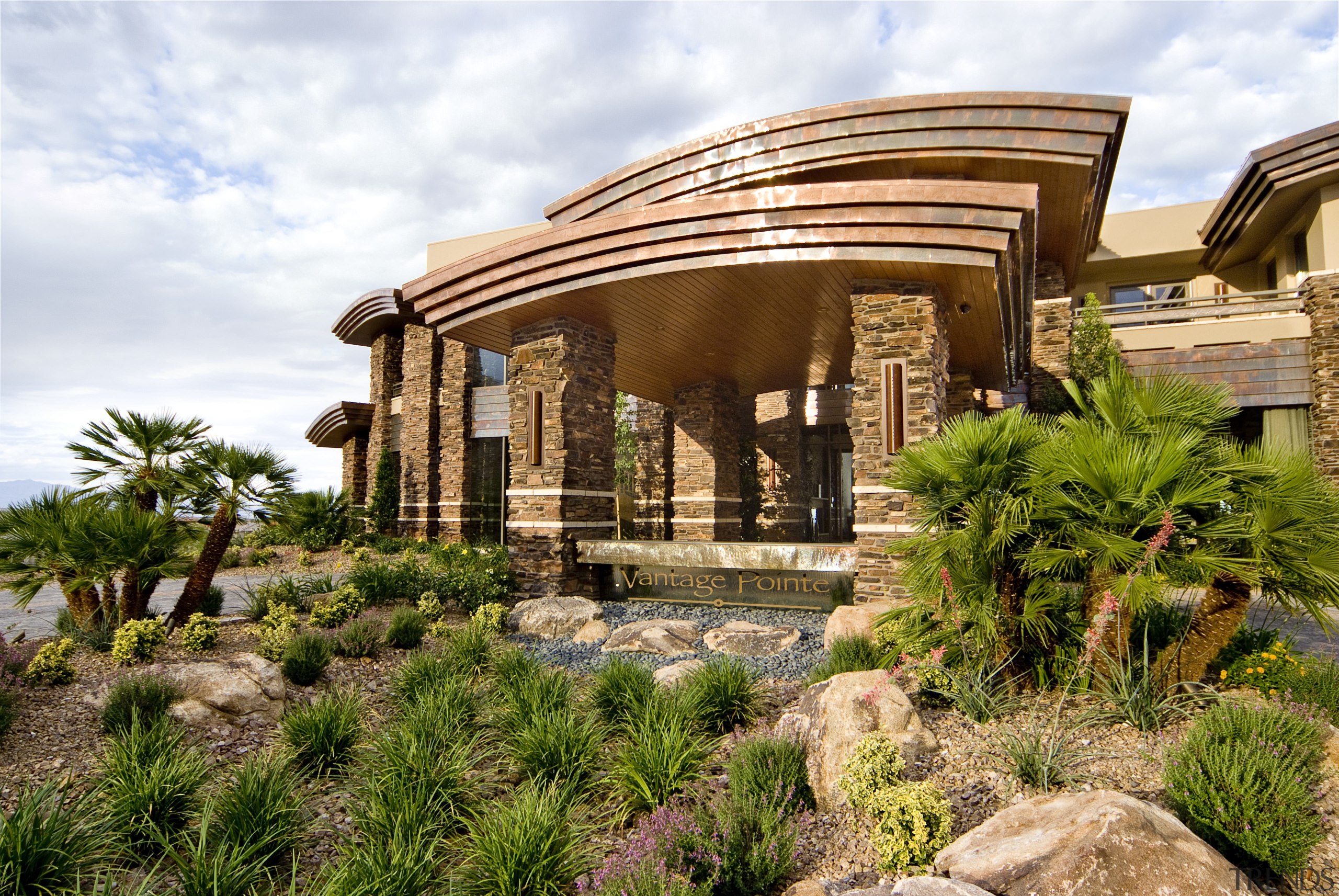 Exterior view of the Sun West Custom Home arecales, estate, hacienda, home, landscape, landscaping, outdoor structure, palm tree, plant, real estate, brown, white