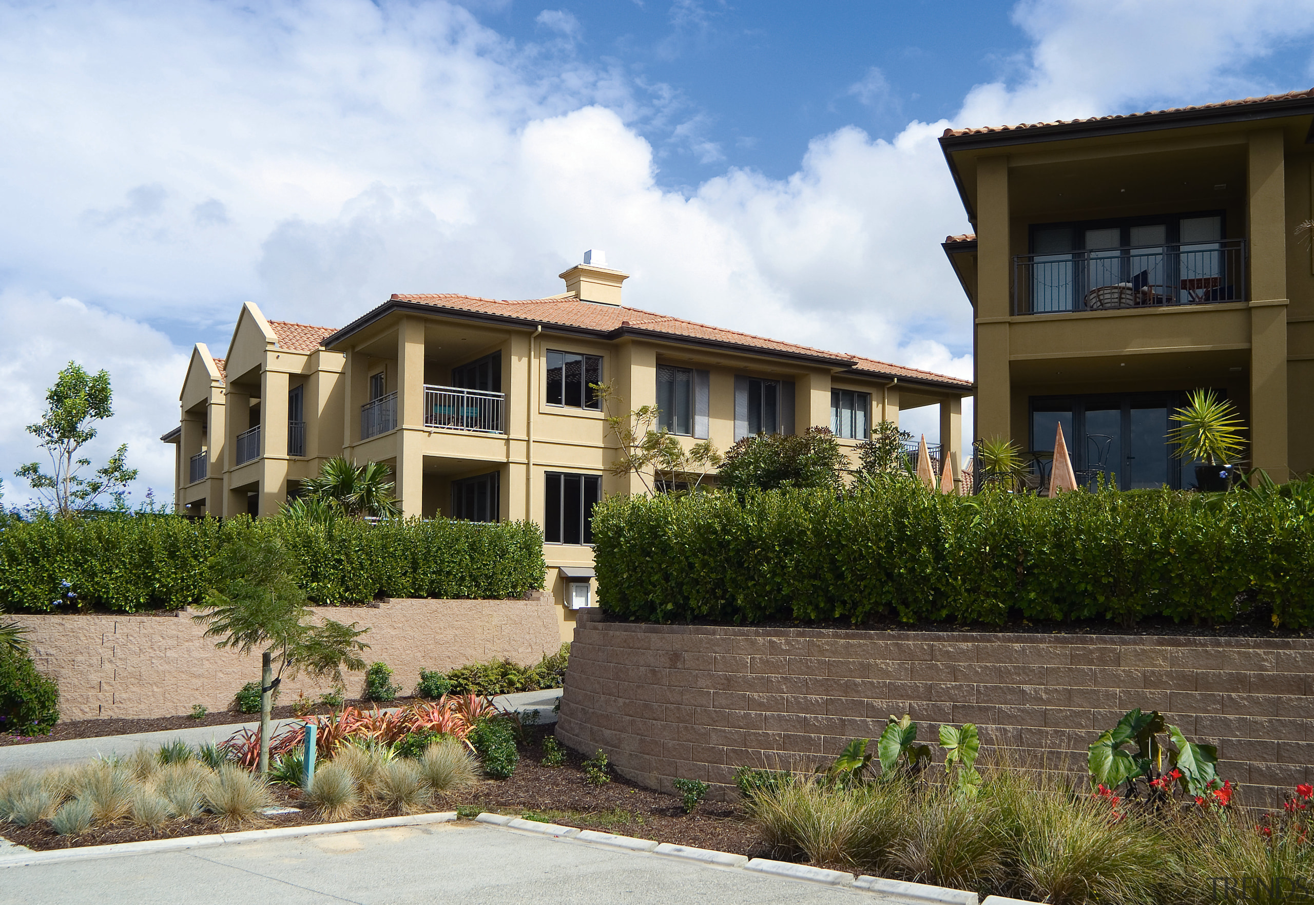 A view of the Point Ridge development. - apartment, building, elevation, estate, facade, home, house, mansion, neighbourhood, official residence, property, real estate, residential area, villa, brown, white