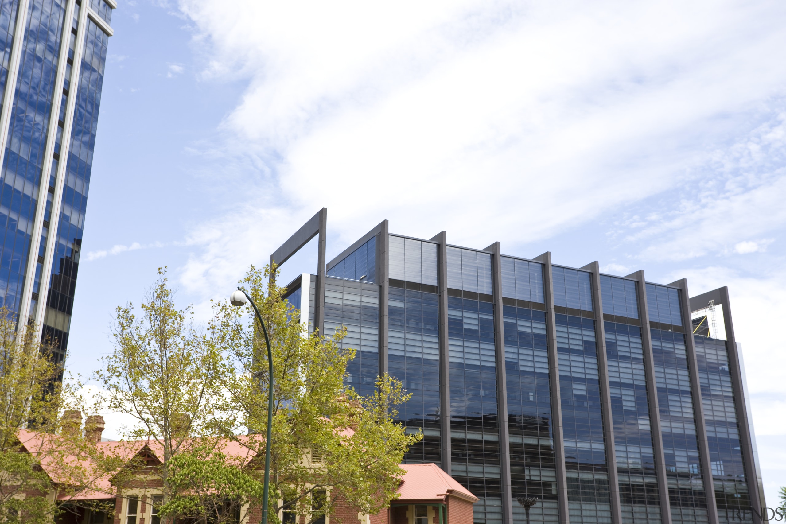 Exterior view of the eco-friendly commercial office tower architecture, building, city, commercial building, condominium, corporate headquarters, daytime, facade, headquarters, metropolis, metropolitan area, mixed use, real estate, sky, skyscraper, tower block, white