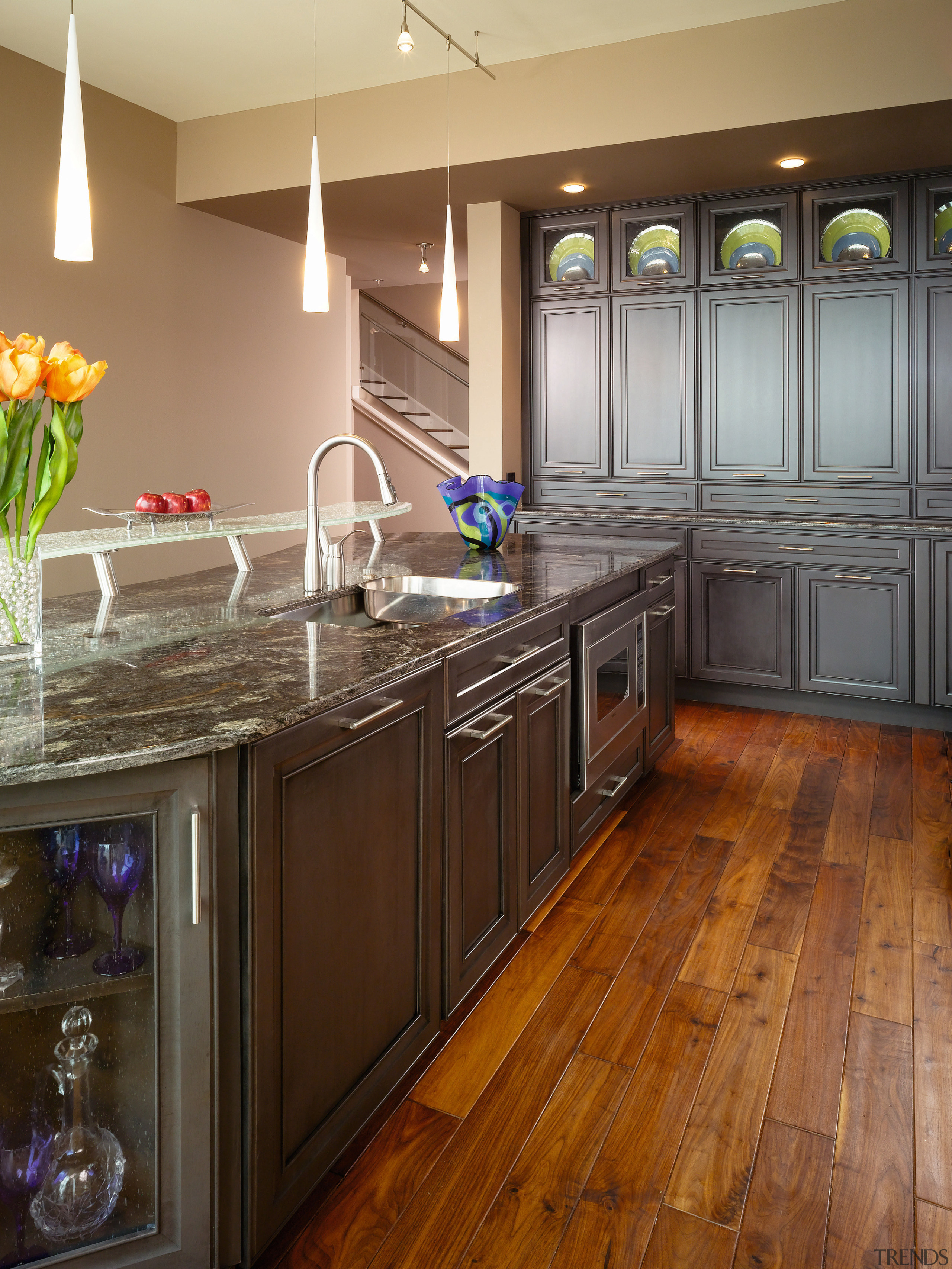 This kitchen by Cornerstone Design was awarded the cabinetry, countertop, cuisine classique, floor, flooring, hardwood, interior design, kitchen, laminate flooring, room, wood, wood flooring, wood stain, brown