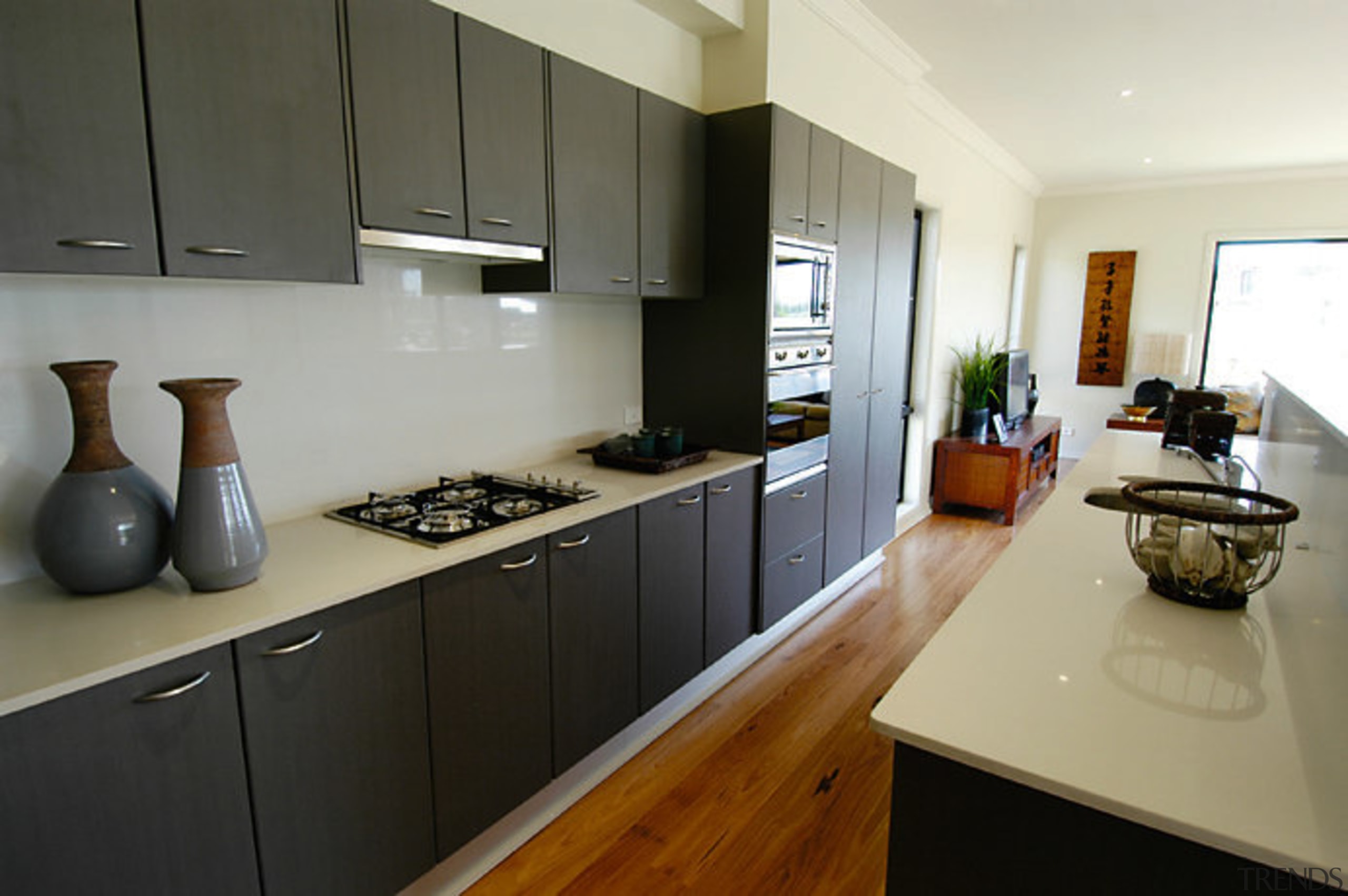 View of this horizontal kitchen - View of countertop, cuisine classique, interior design, kitchen, real estate, room, gray, black