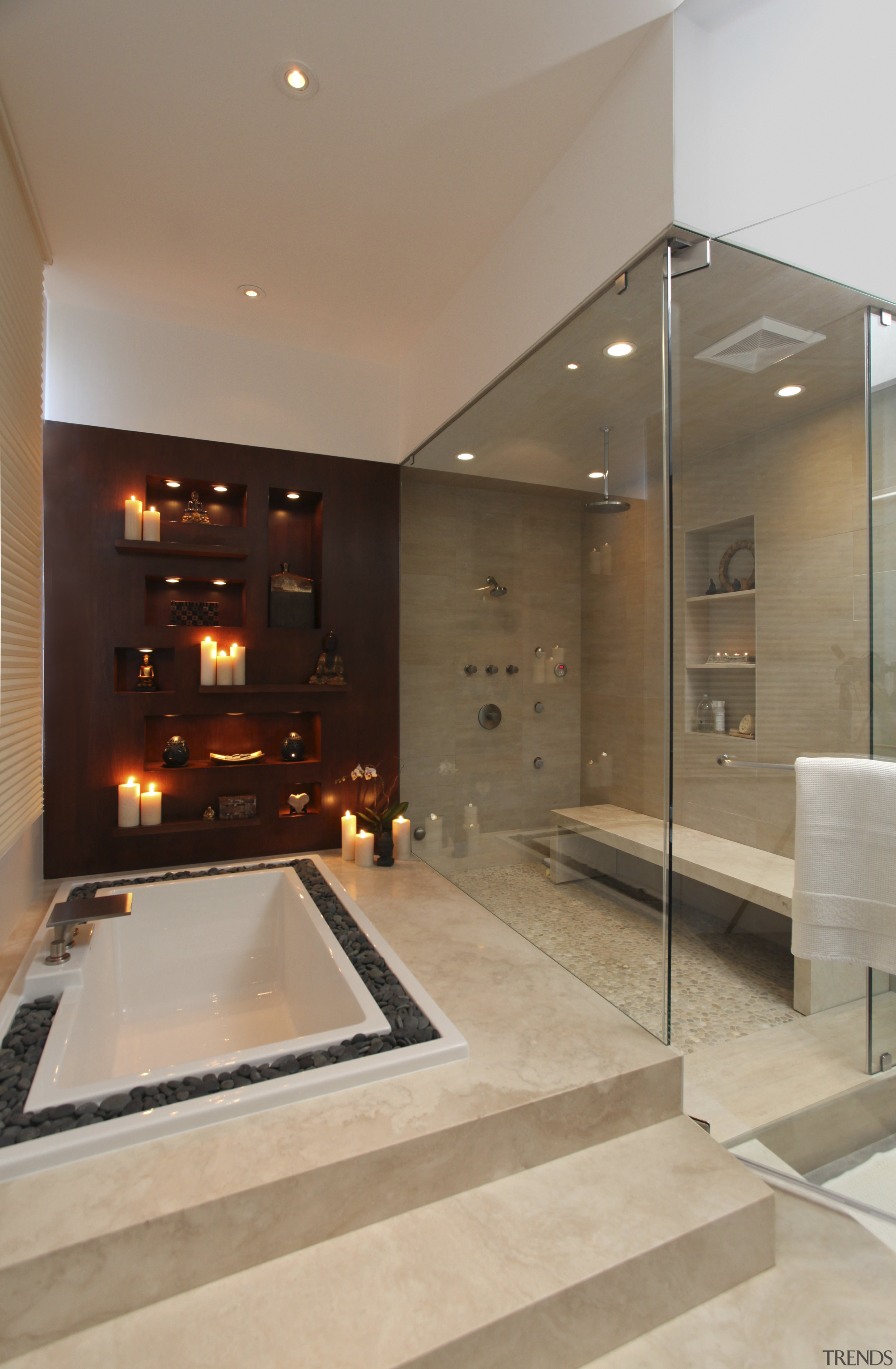 There is a distinctive Asian look to the bathroom, ceiling, floor, flooring, interior design, lobby, tile, brown, gray