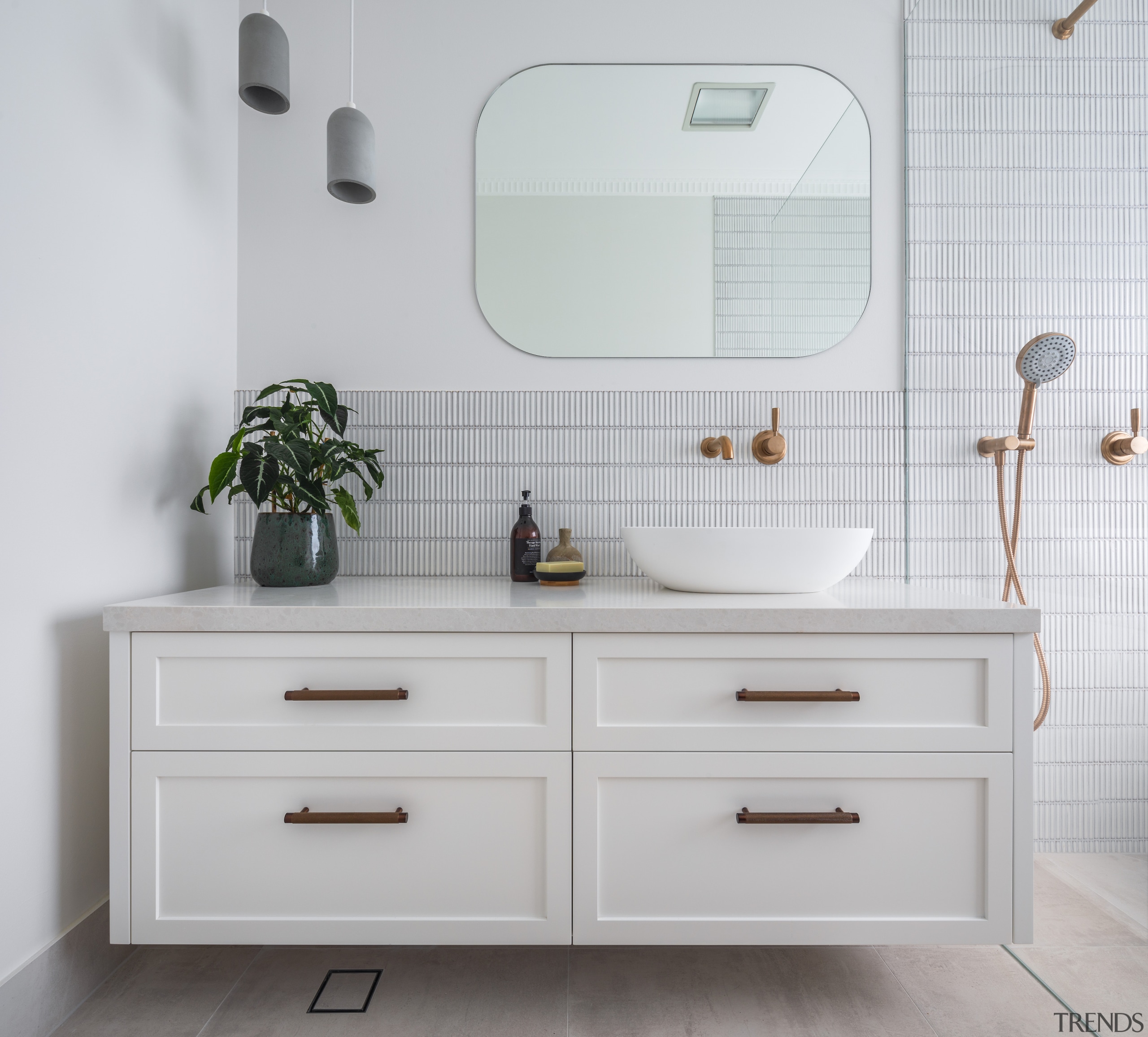 Cantilevering the vanity also adds to the bathroom's 