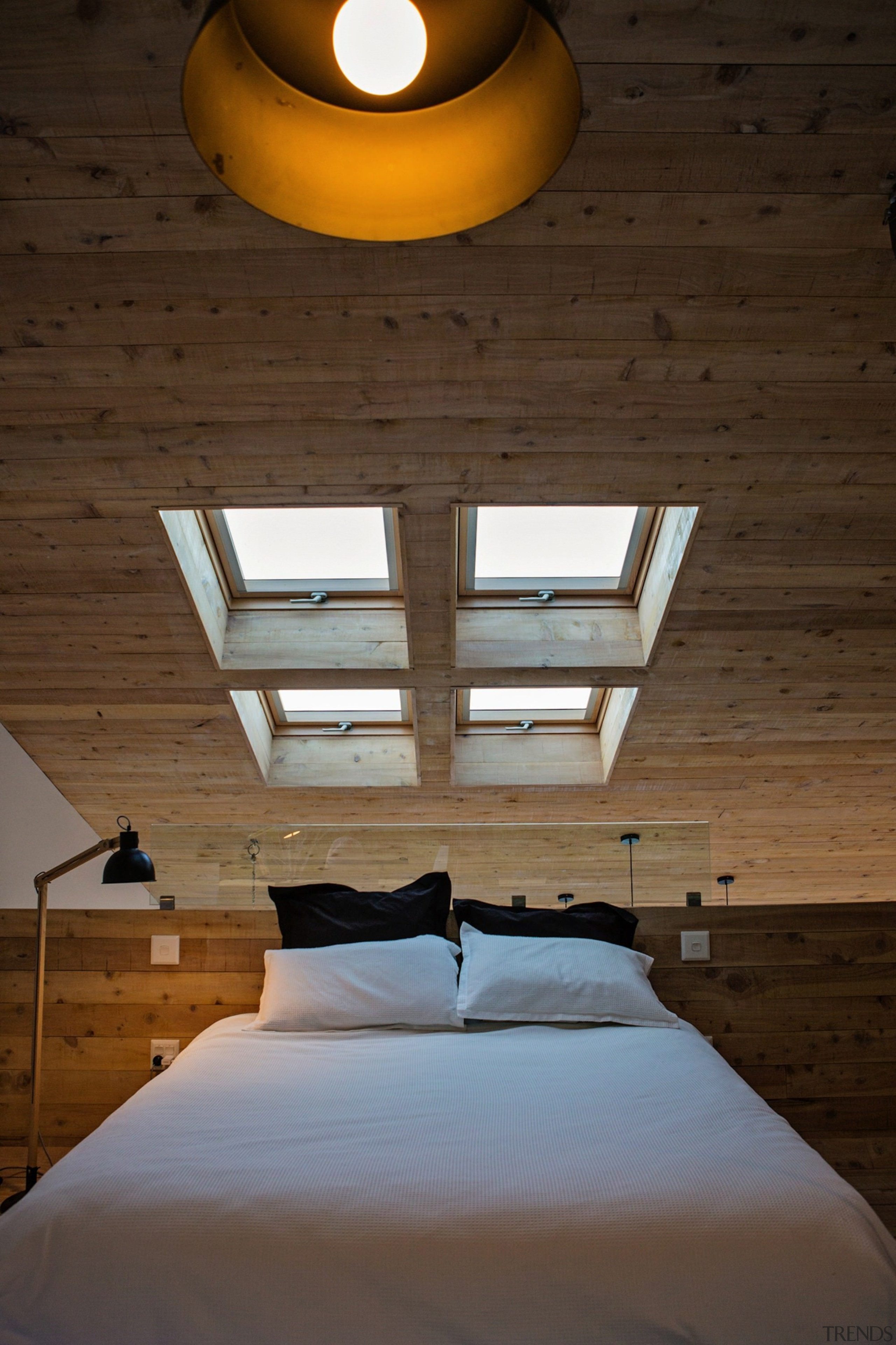 This skylight sits over the master bedroom - architecture, bed, bed frame, bedroom, ceiling, daylighting, floor, home, house, interior design, lighting, room, suite, wall, wood, brown