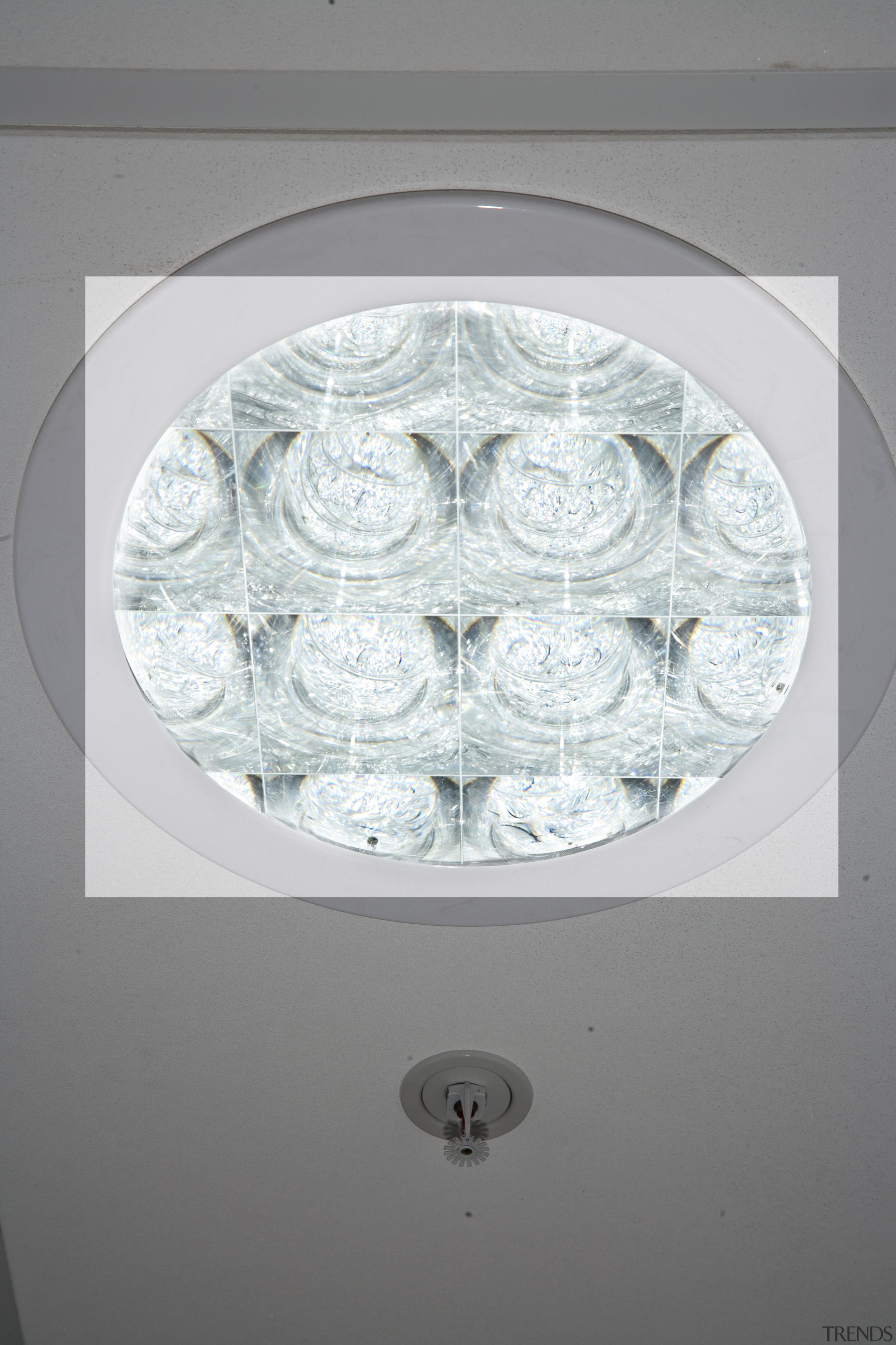 View of a lighting fixture at the Lion ceiling, circle, lampshade, light, light fixture, lighting, lighting accessory, product design, gray, white