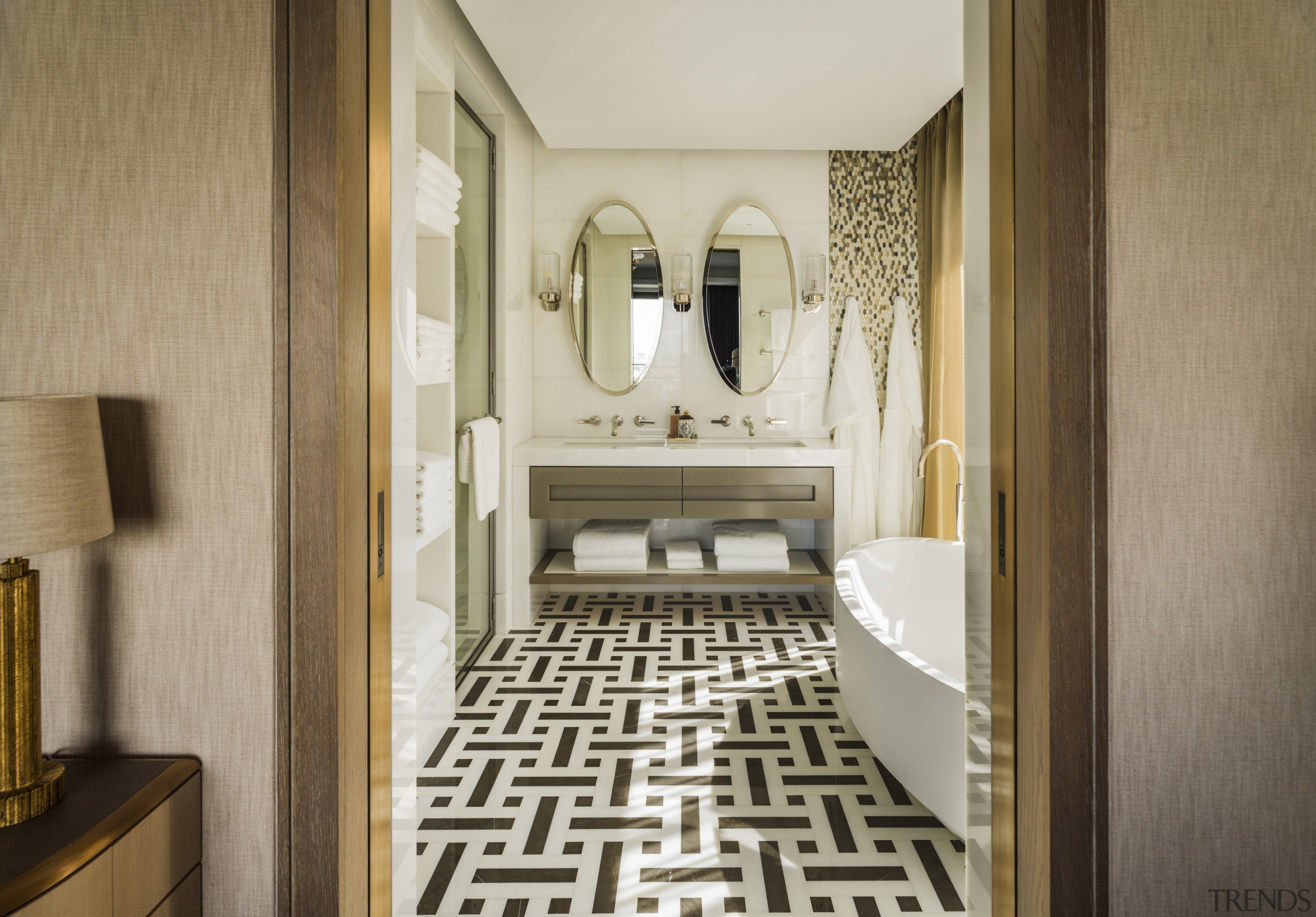 The master bathroom, screened from the bedroom with 