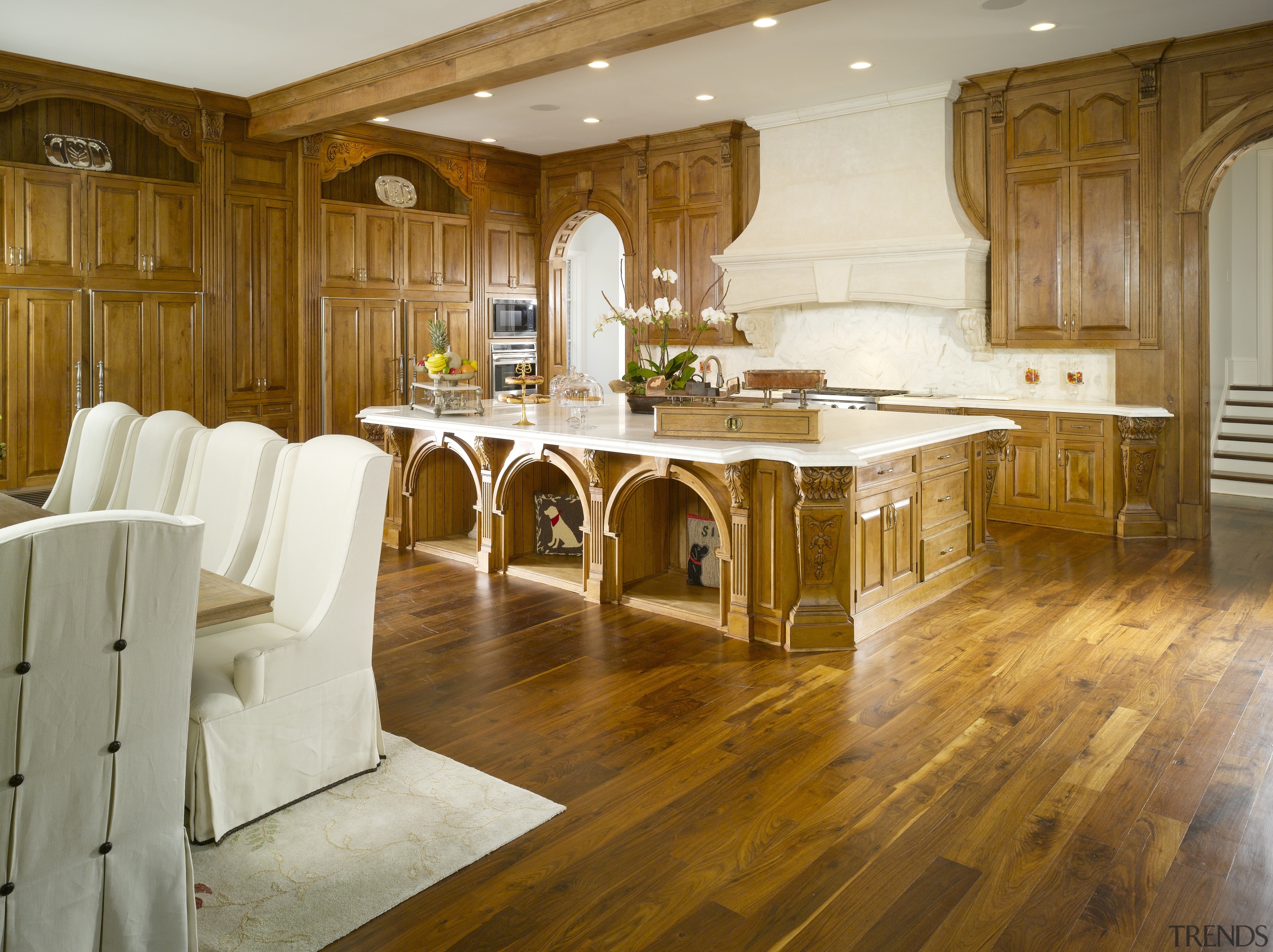 View of classical kitchen &amp; dining area with cabinetry, countertop, cuisine classique, floor, flooring, furniture, hardwood, home, interior design, kitchen, laminate flooring, room, table, wood, wood flooring, brown, white