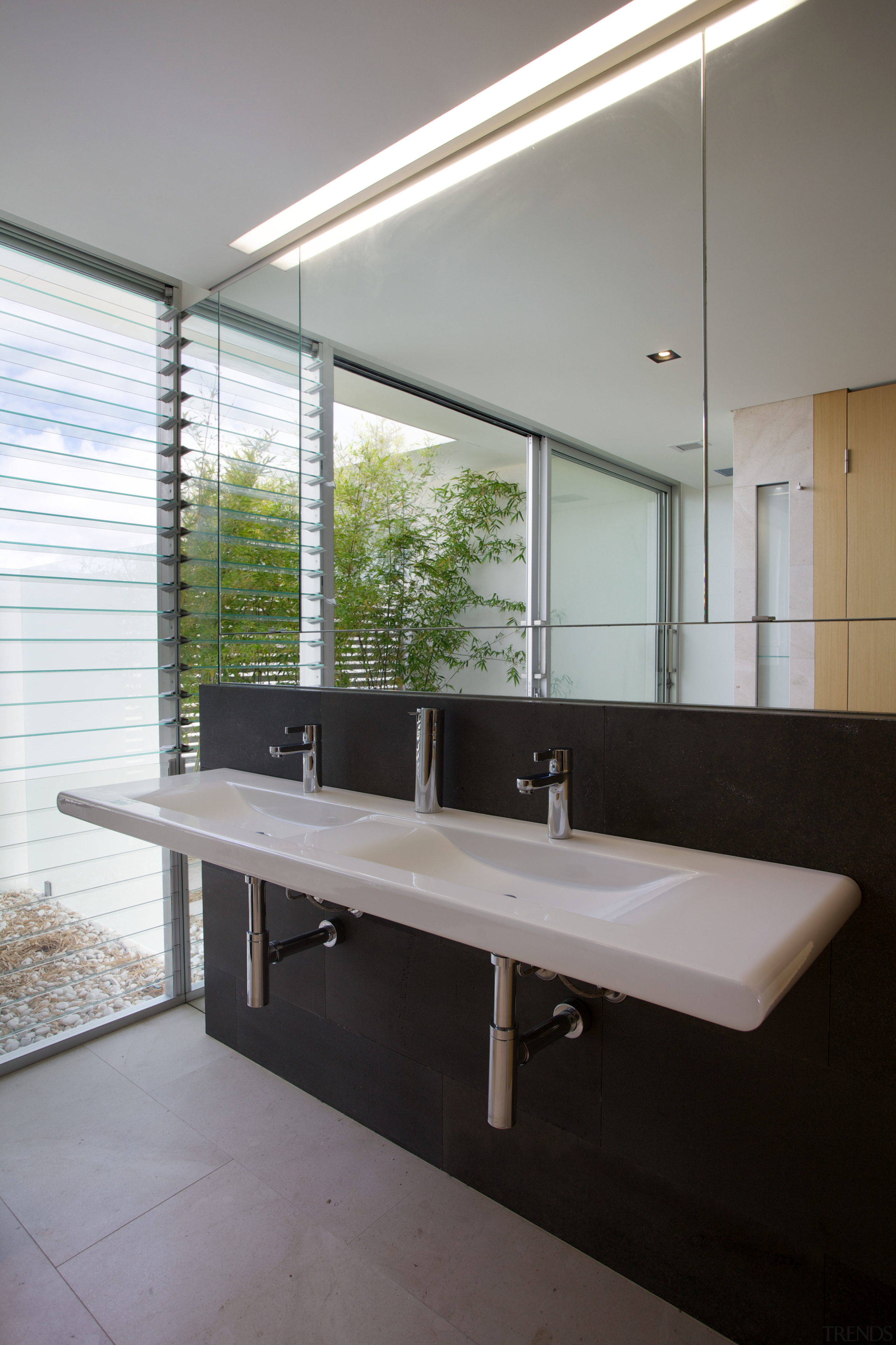 The storage in this ensuite bathroom is on architecture, bathroom, daylighting, glass, house, interior design, sink, window, gray