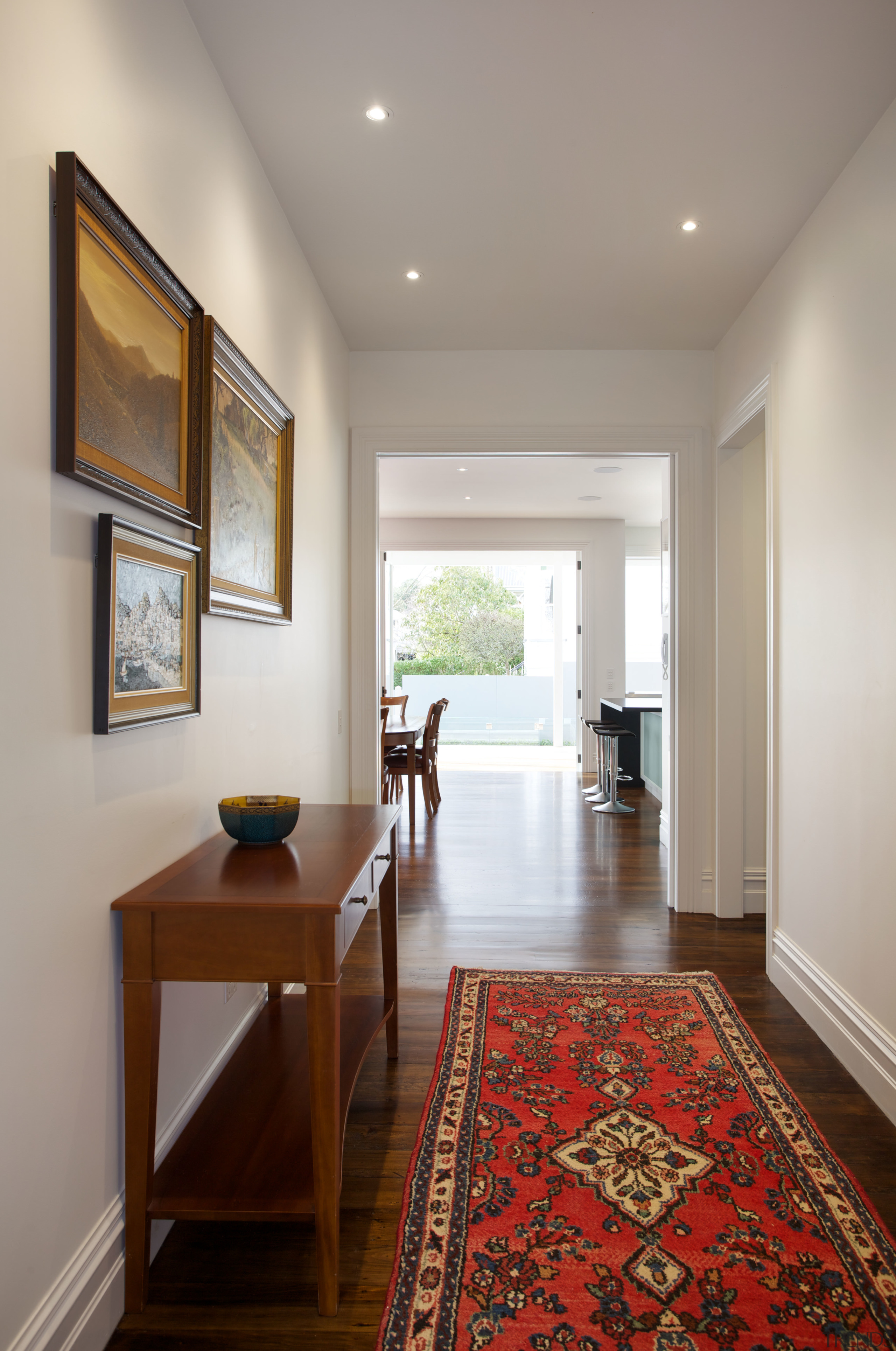 This hallway was widened in a major villa ceiling, floor, flooring, hardwood, home, interior design, living room, real estate, room, window, wood flooring, gray
