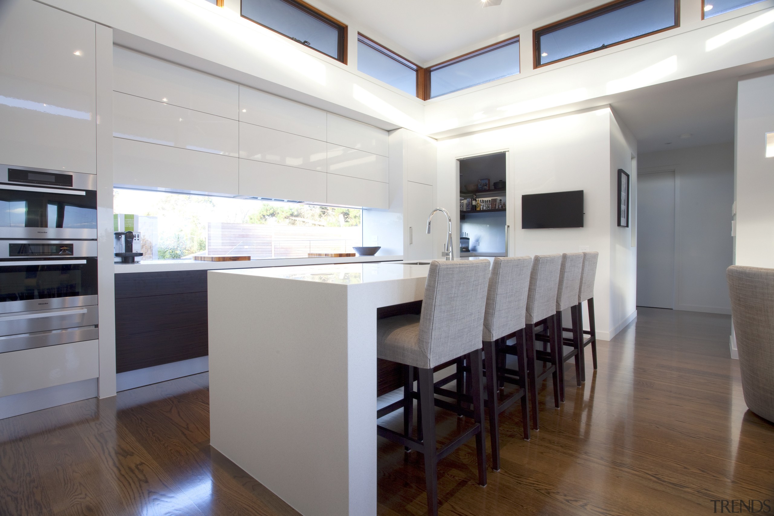 Graeme Alexander Homes project connects to its setting floor, flooring, interior design, kitchen, real estate, room, table, gray, white