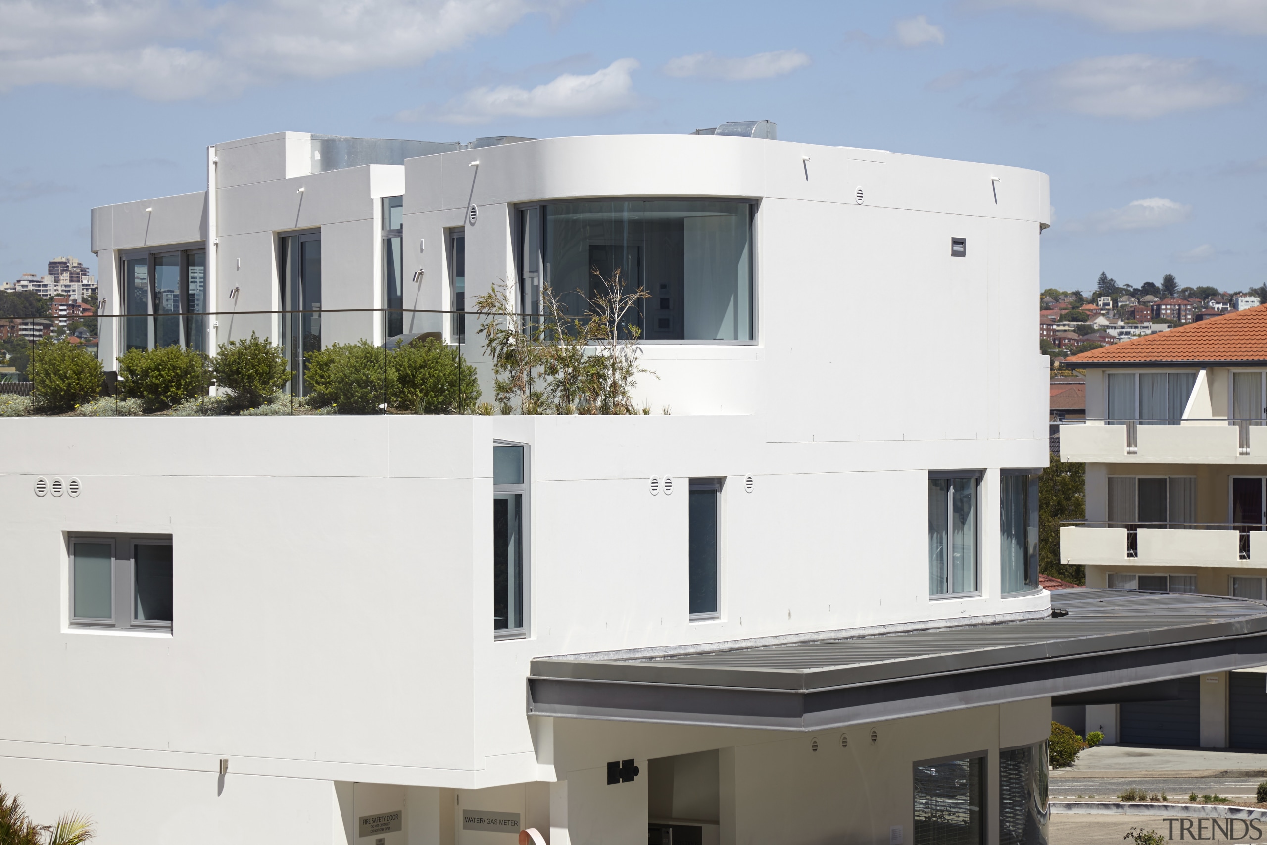 Well-rounded  apartment block by architect Nicholas Solomon architecture, building, facade, home, house, property, real estate, residential area, white, gray