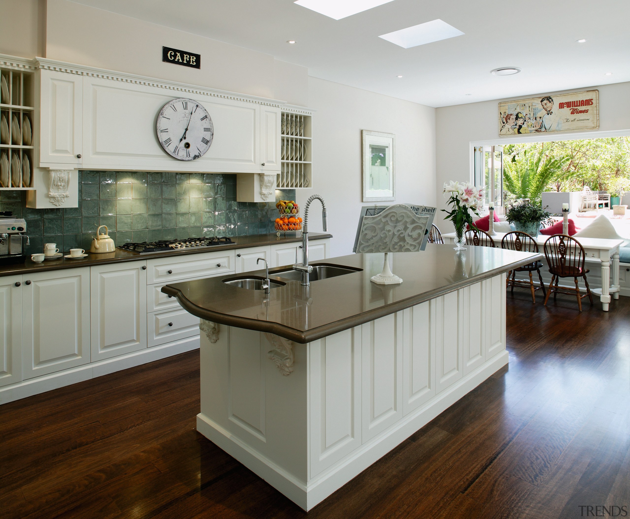 Kitchen with cream cabinetry, granite benchtops, timber flooring cabinetry, countertop, cuisine classique, floor, flooring, hardwood, interior design, kitchen, laminate flooring, room, wood flooring, gray