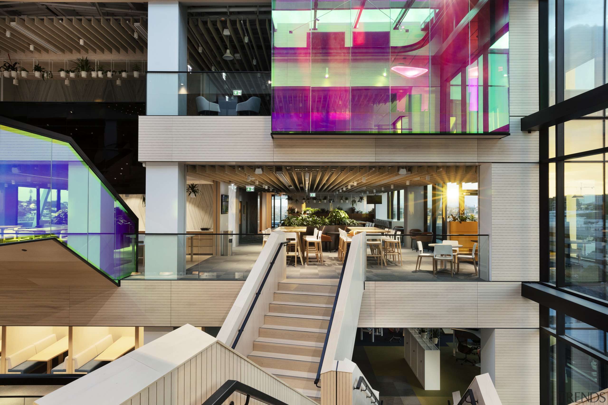 A scissor stair reaches across the atrium divide Mercury, Warren and Mahoney,  architecture, commercial building, design, facade, lobby, mixed-use