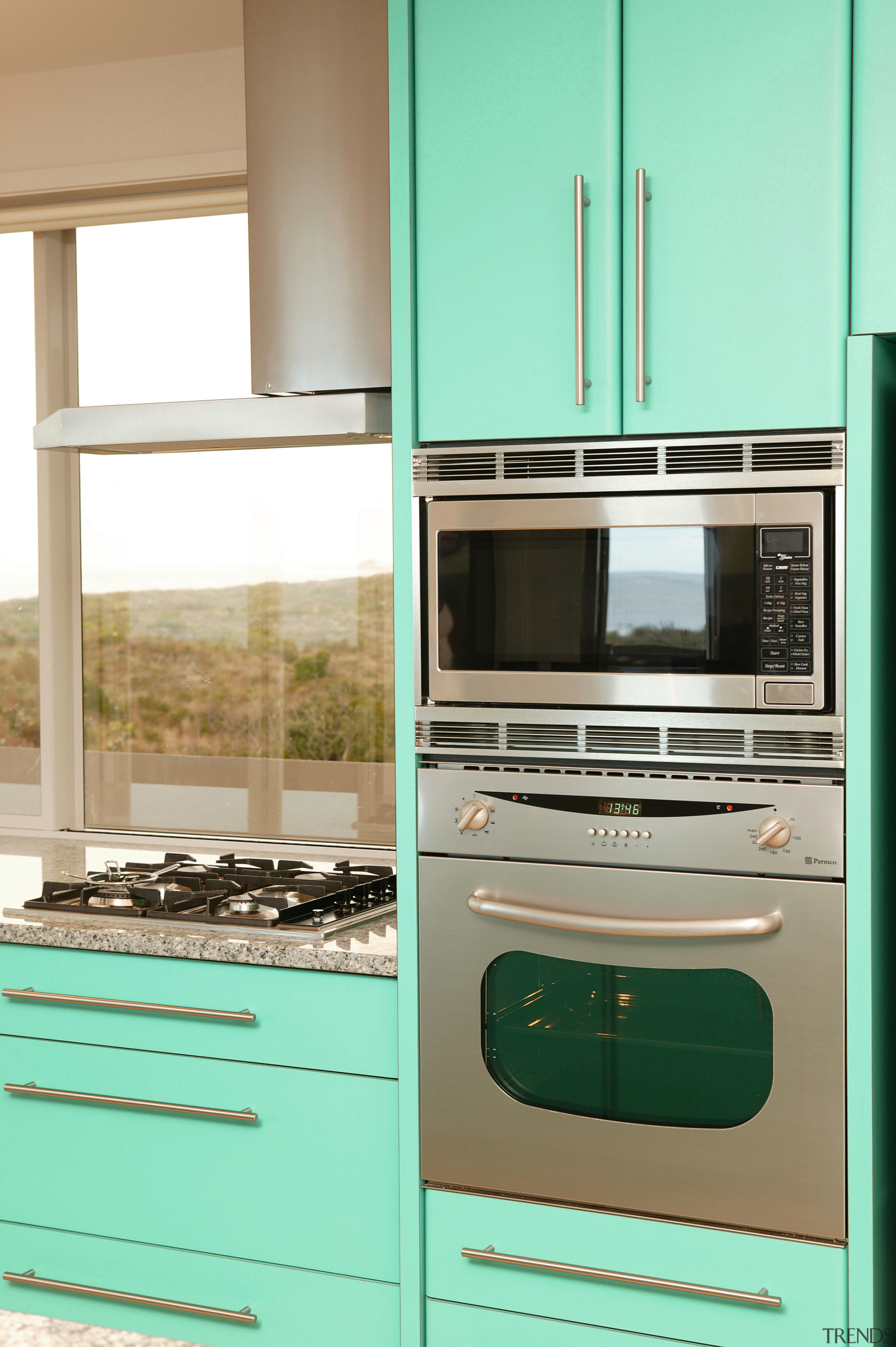 Kitchen with stainless steel wall oven and microwave countertop, home appliance, kitchen, kitchen appliance, kitchen stove, major appliance, room, teal