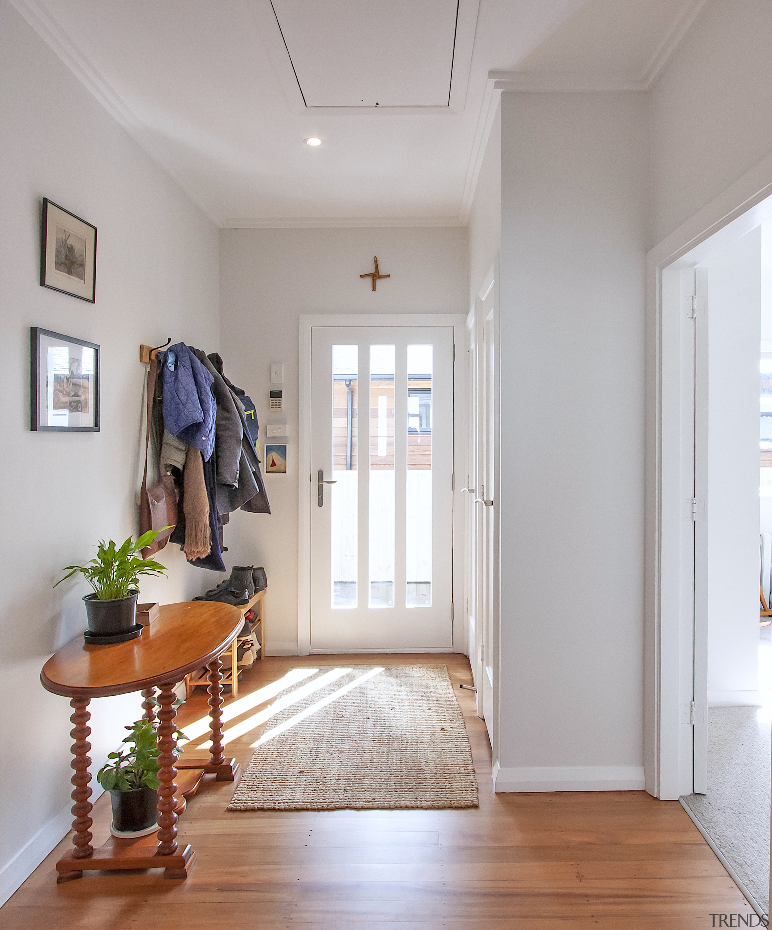 Front entry, with the wood and white decor 