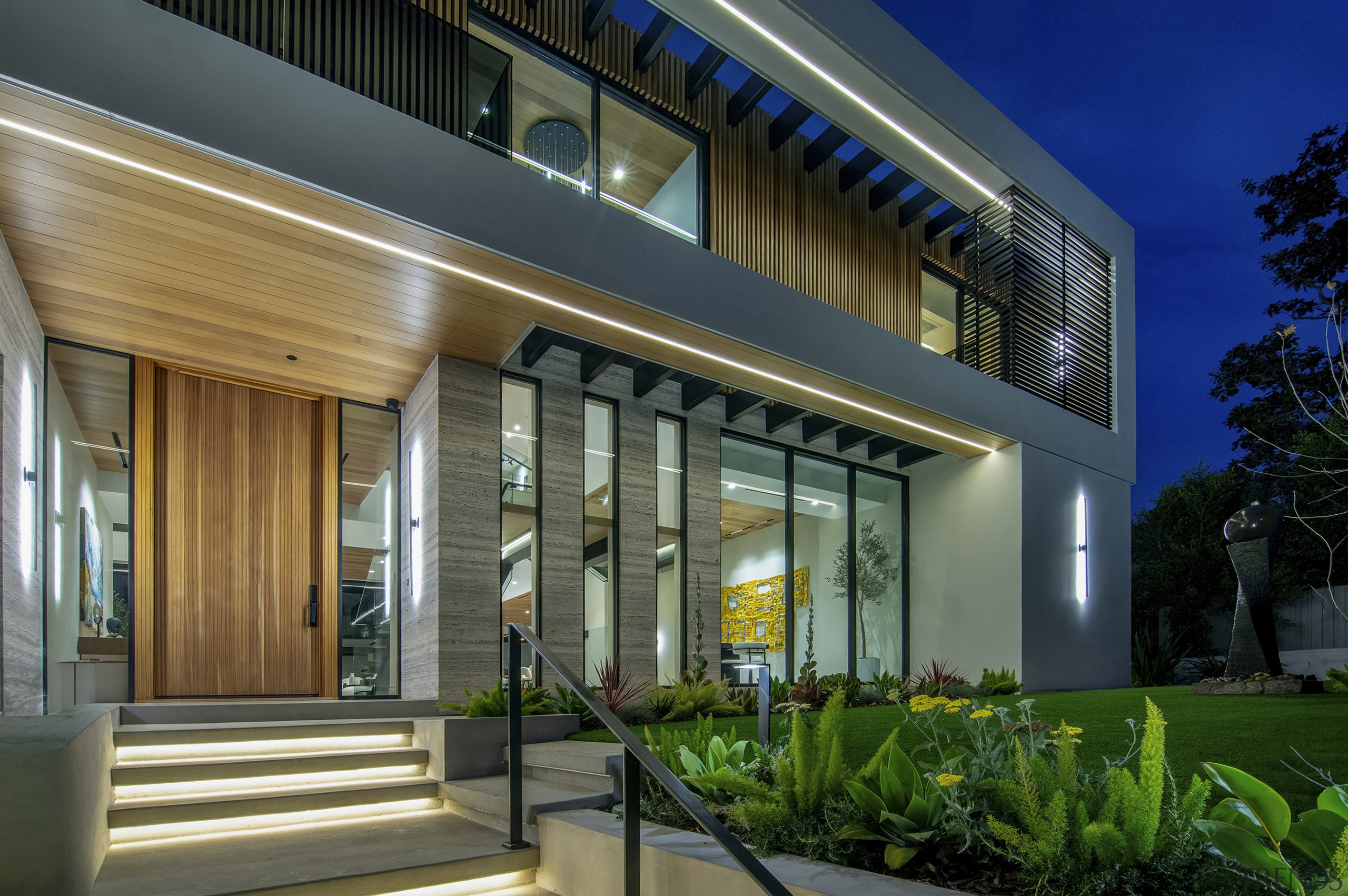 Front door entrance with glass walls and ribbon 