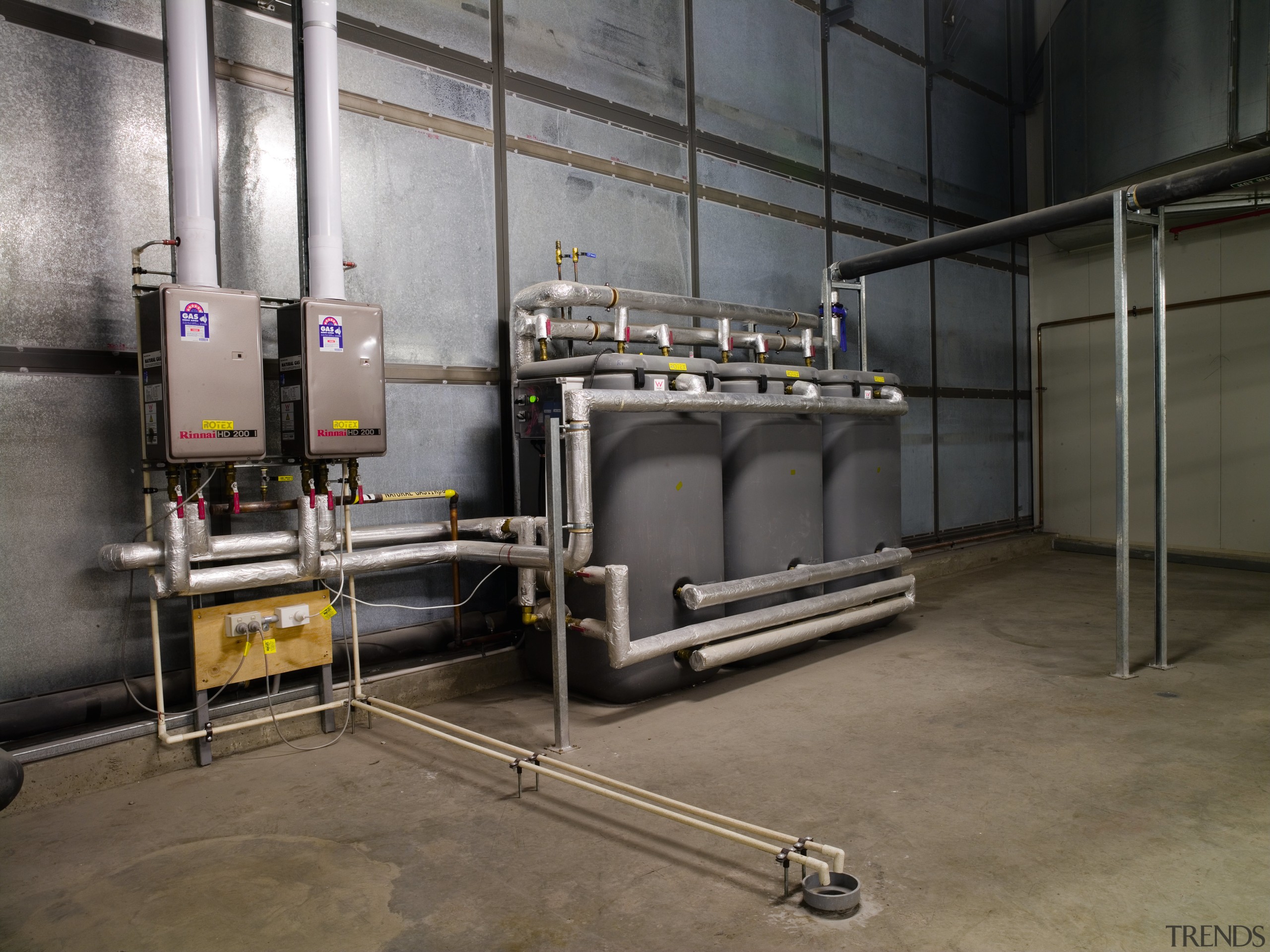 A view of the plumbing system. - A factory, industry, machine, manufacturing, gray, black