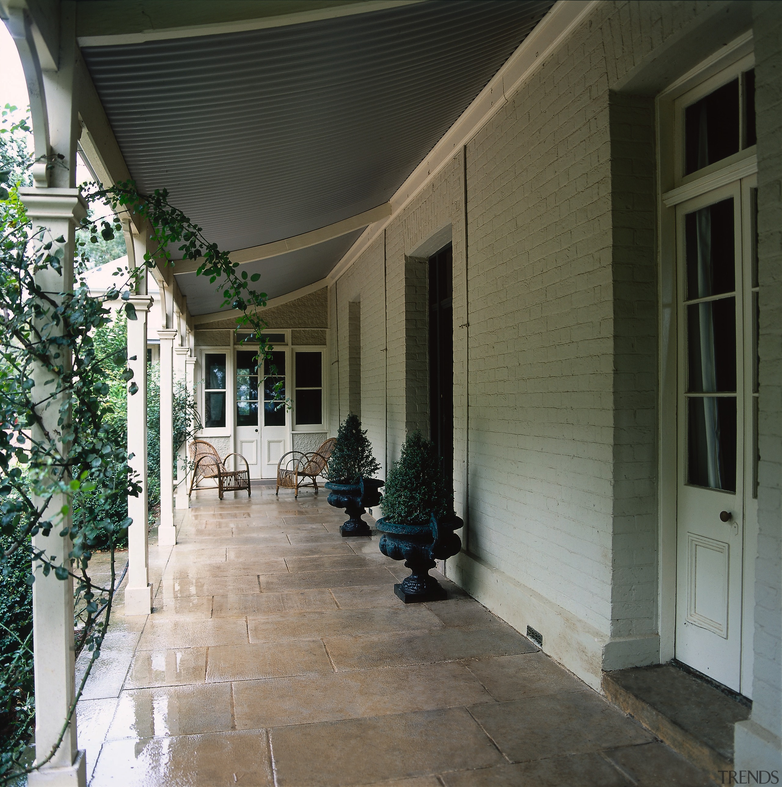 The view of the verandah of a country architecture, ceiling, courtyard, estate, floor, home, house, interior design, porch, property, real estate, wall, window, black, gray