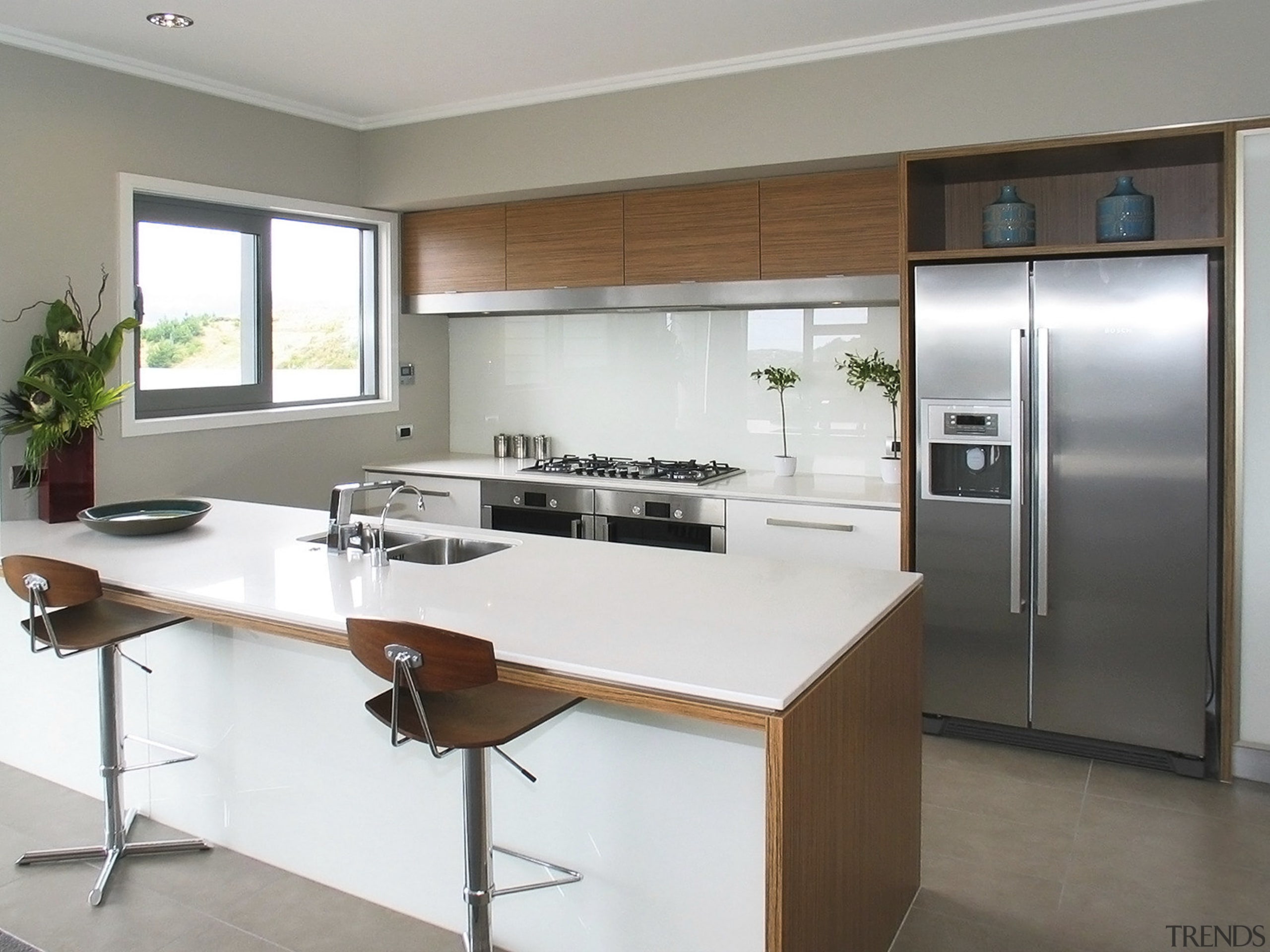 View of a kitchen which was designed by cabinetry, countertop, cuisine classique, interior design, kitchen, real estate, white, gray