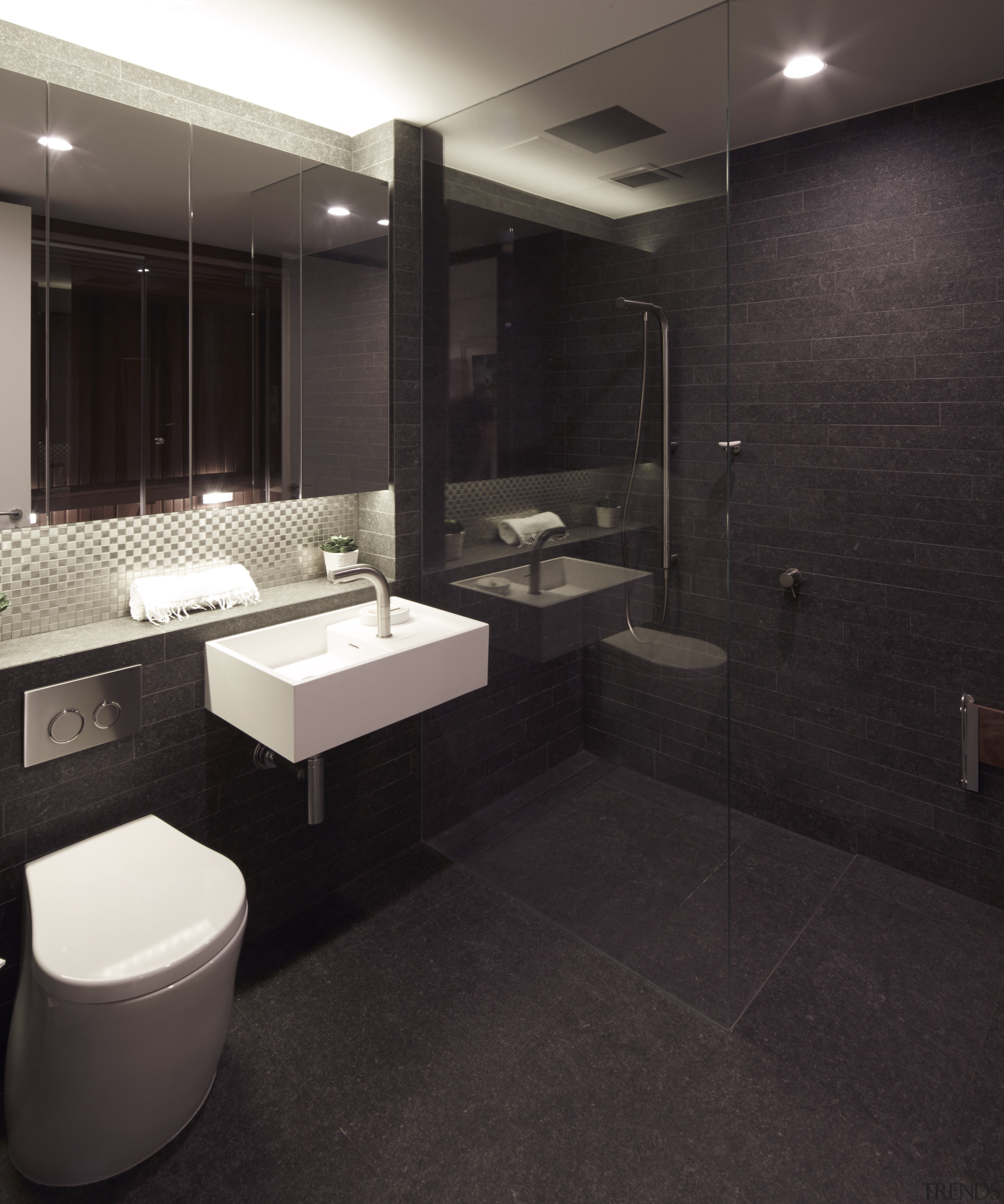 Dark tile bathroom in modern apartment renovation - architecture, bathroom, floor, flooring, interior design, room, sink, tile, wall, black