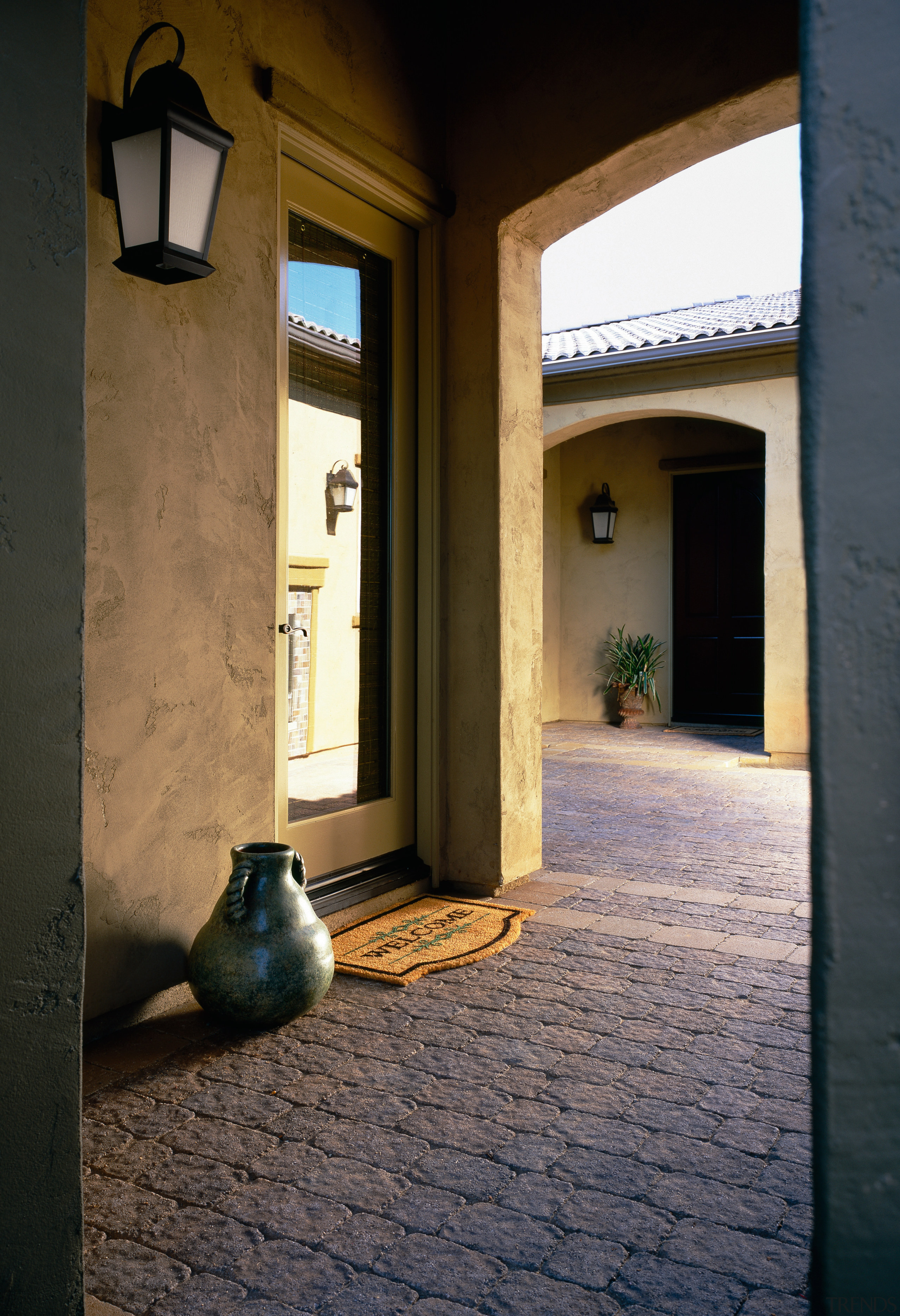 Outdoor entrance area with Bergerac pavers. - Outdoor alley, architecture, building, door, facade, home, house, shadow, window, black, brown