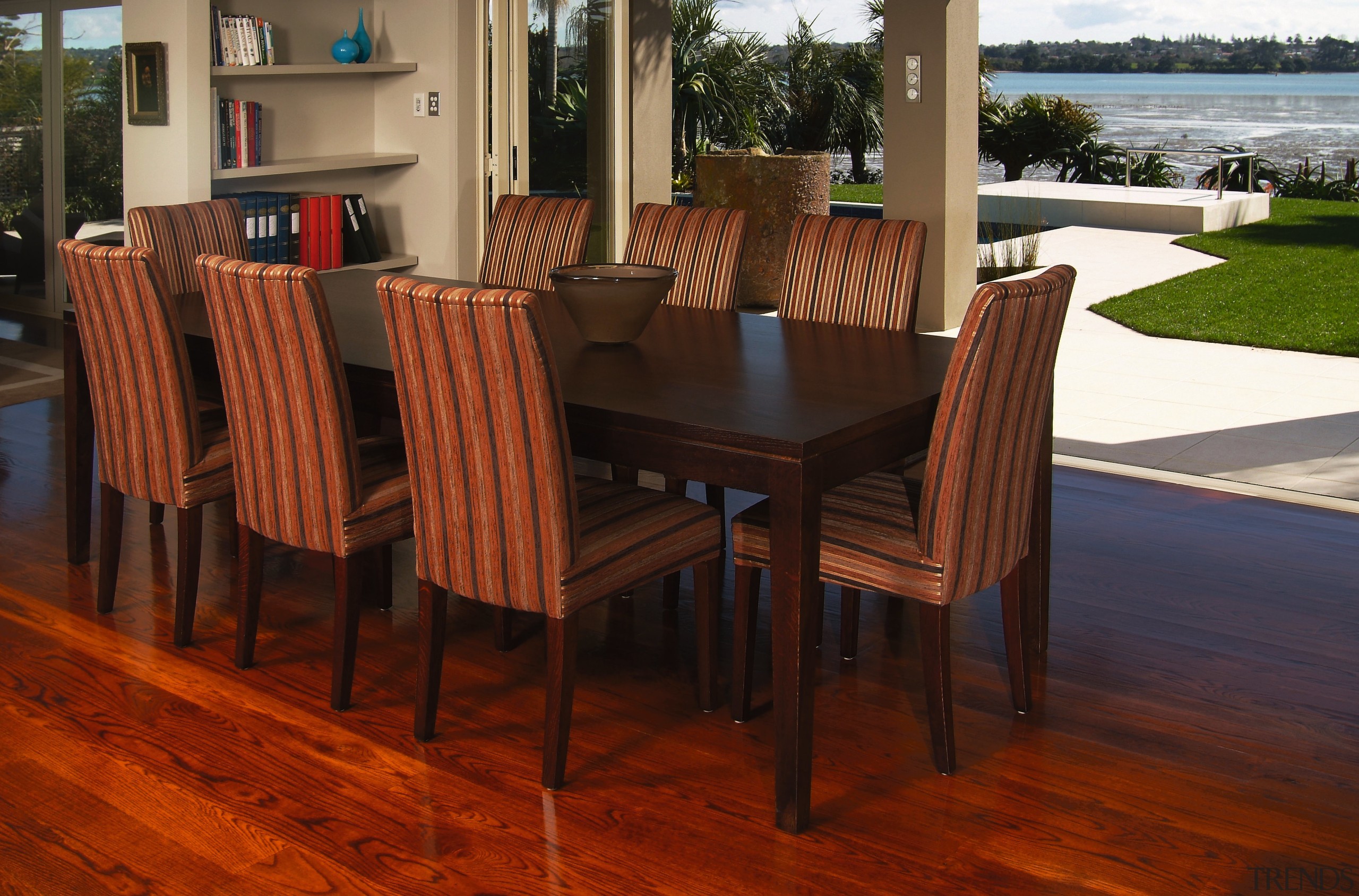 A view of some furniture from Nobelwood. - chair, dining room, floor, flooring, furniture, hardwood, kitchen & dining room table, laminate flooring, table, wood, wood flooring, wood stain, red