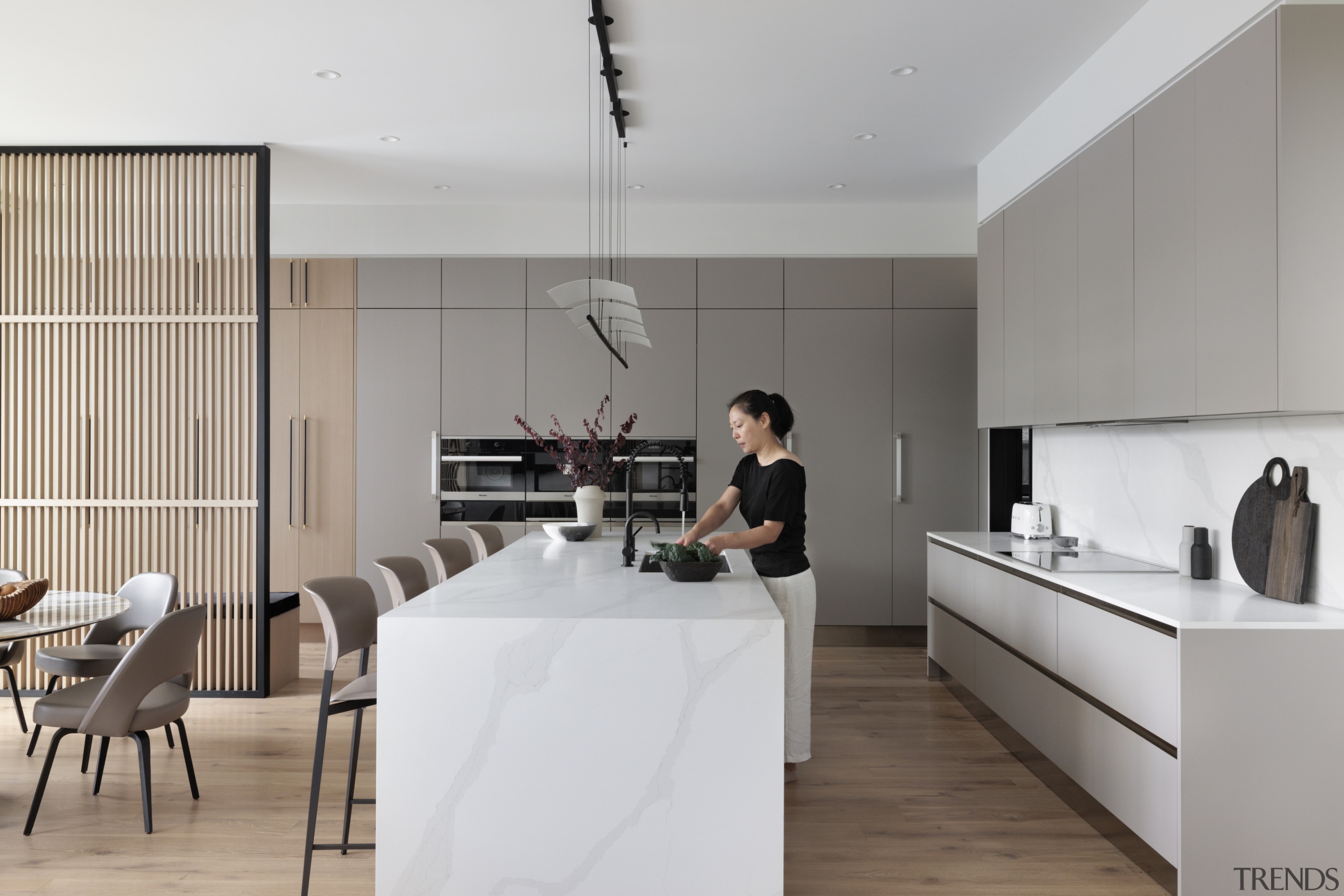 The contemporary kitchen with a wealth of storage. 