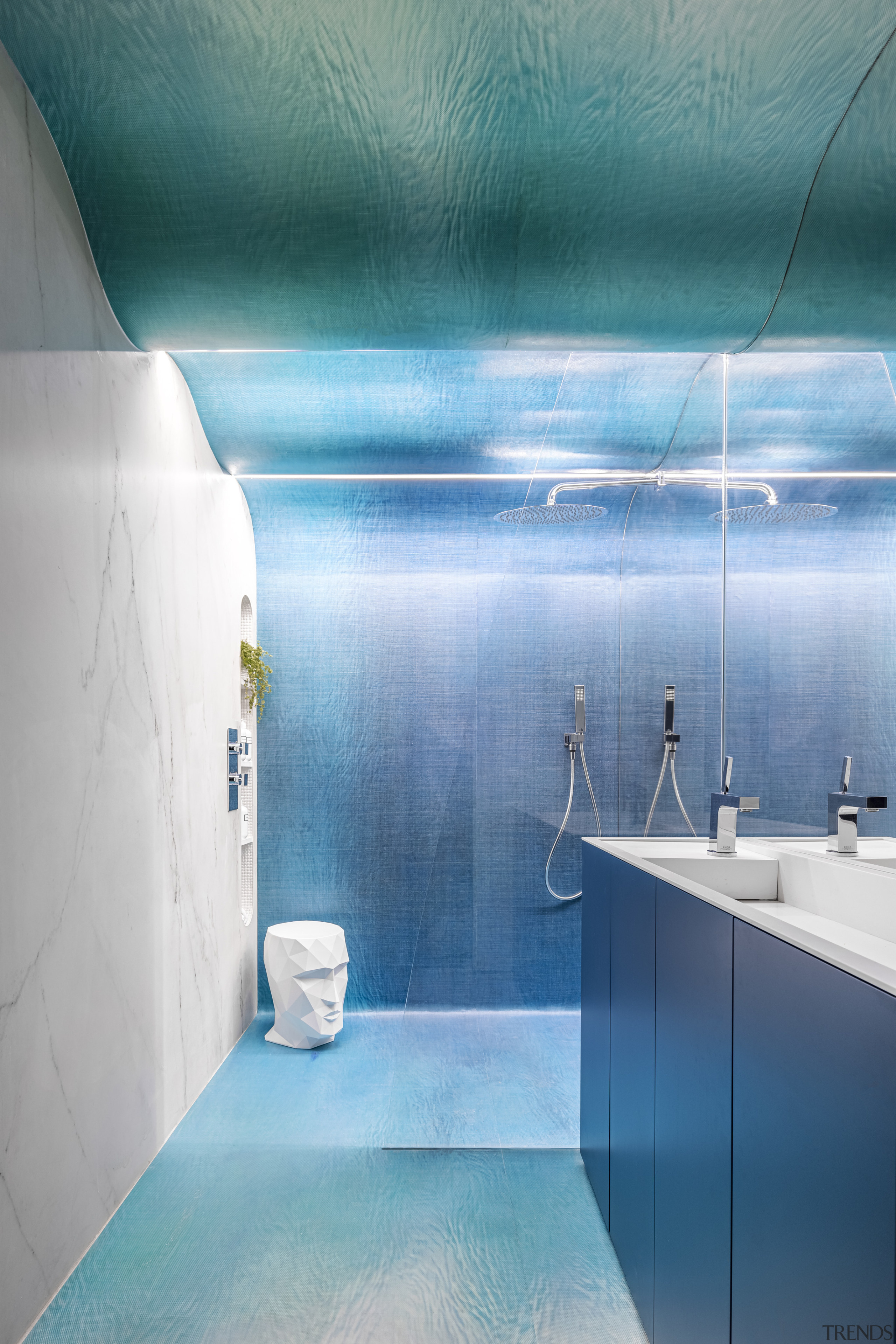 The wild master bathroom with its wave-like ceiling 