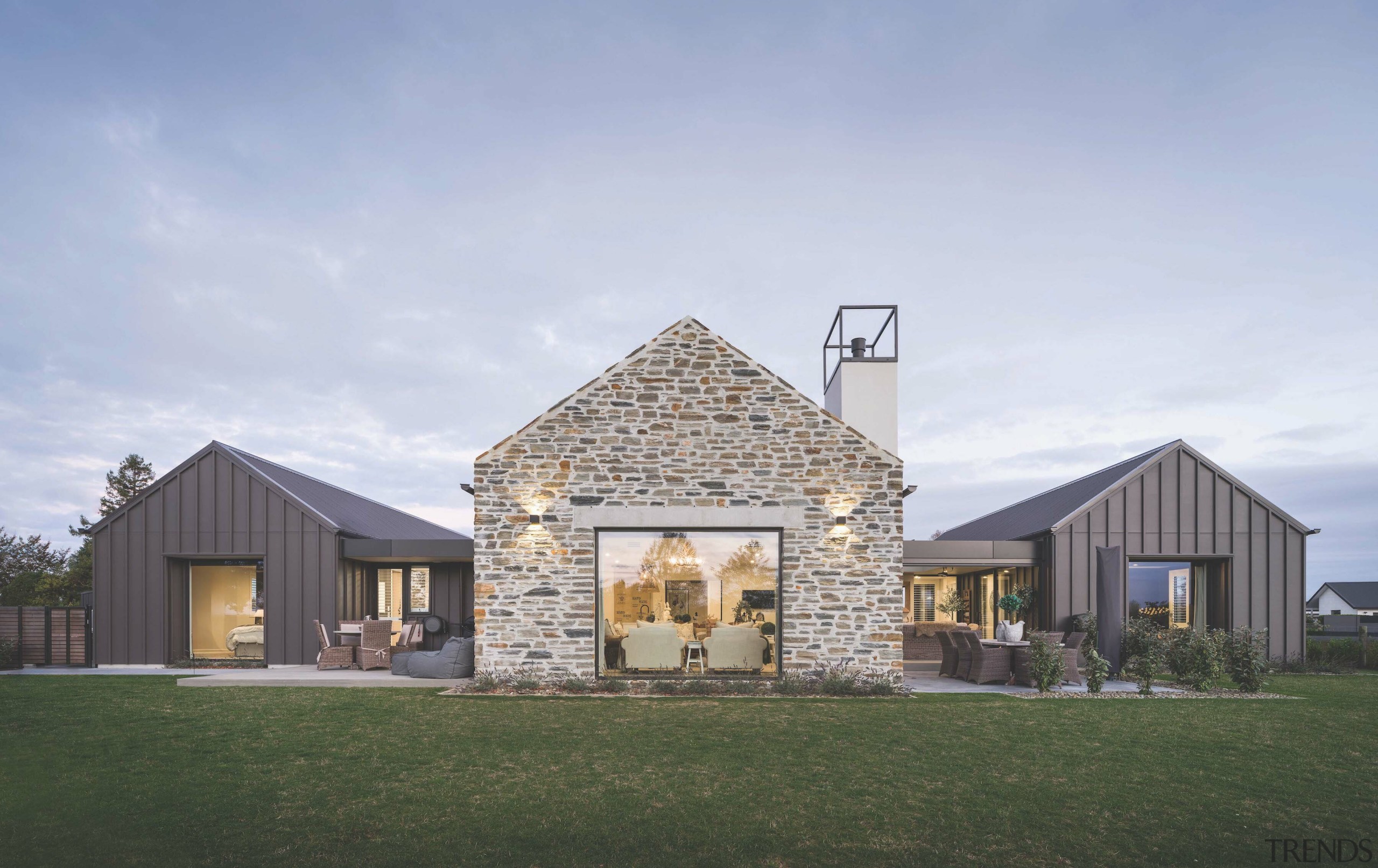 The house is designed as three gabled pavilions 
