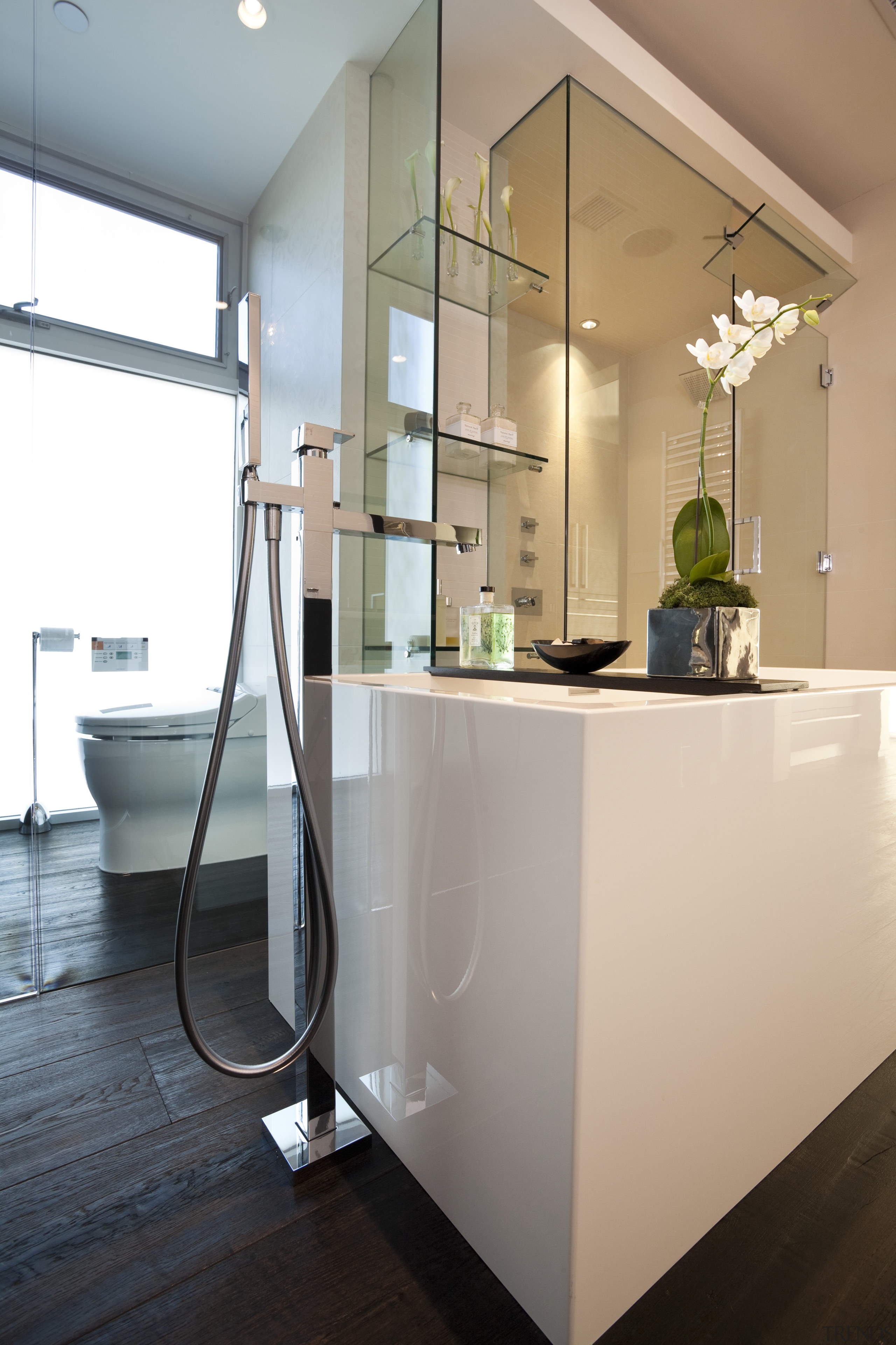 View of contemporary bathroom with dark flooring. - home, interior design, product design, gray