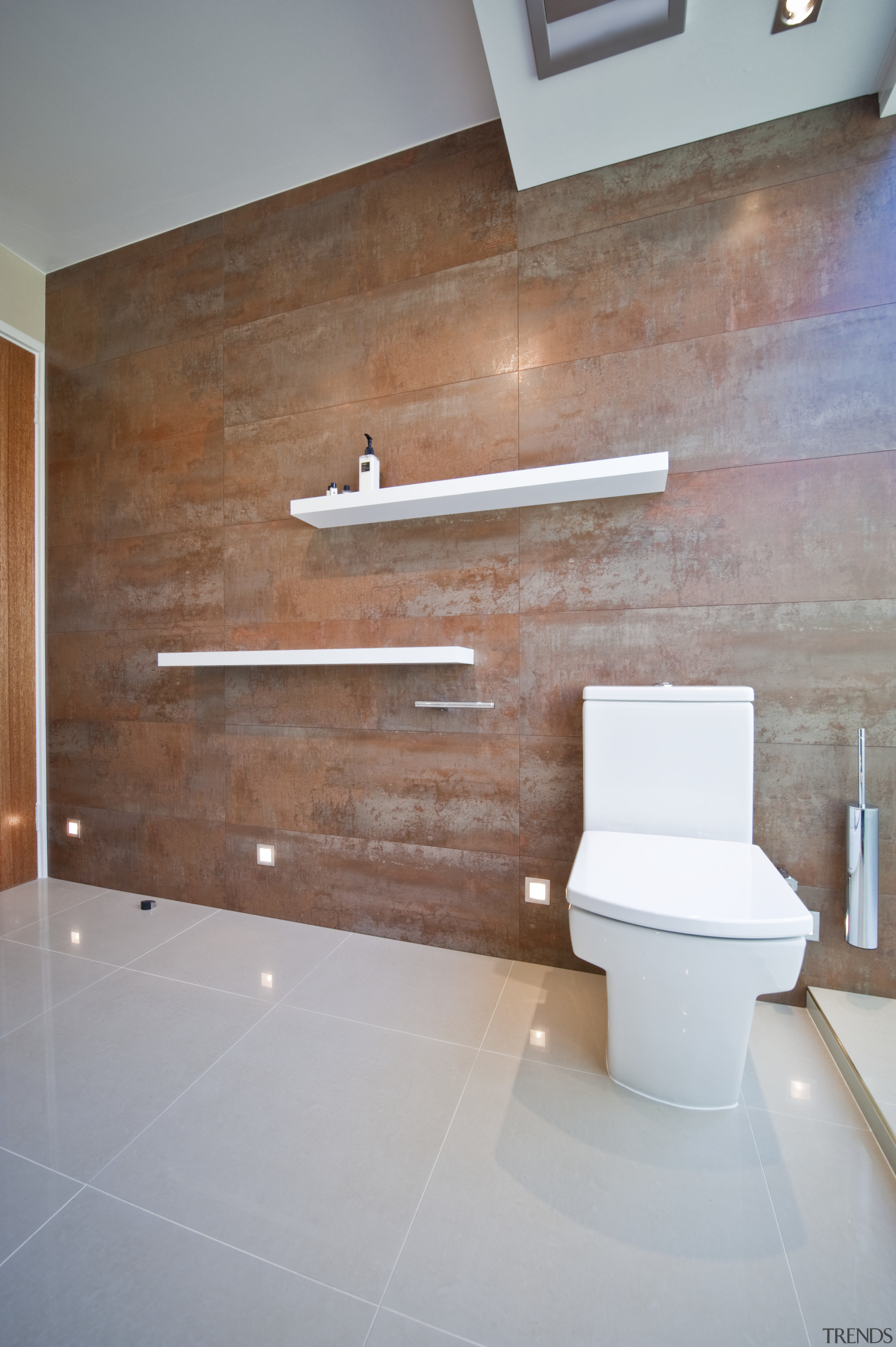 View of home theater powder room designed by architecture, bathroom, daylighting, floor, flooring, hardwood, interior design, plumbing fixture, product design, room, sink, tap, tile, wall, wood, gray, brown