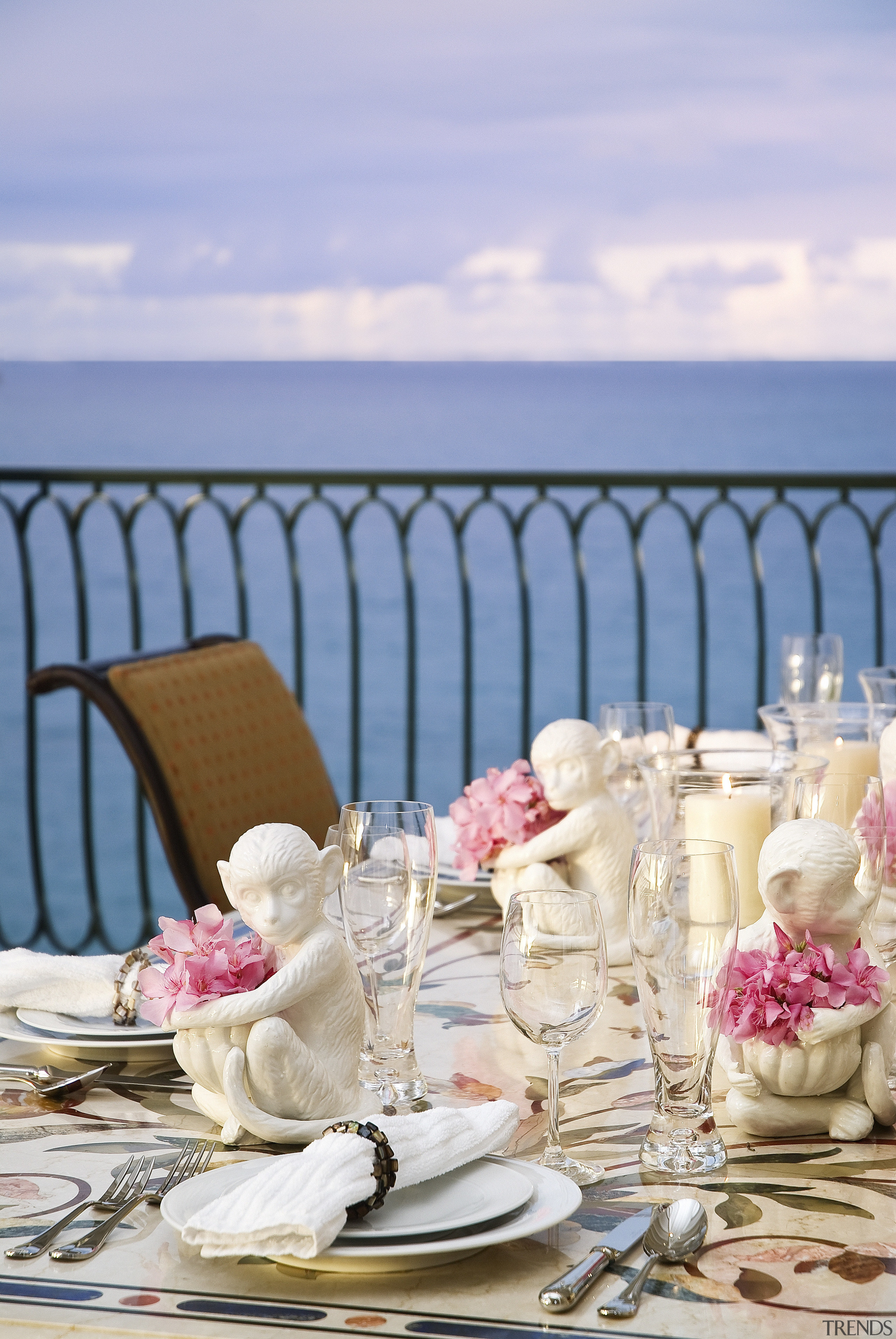 This home was designed by Geoffrey Bradfield. Here summer, teal, blue, white