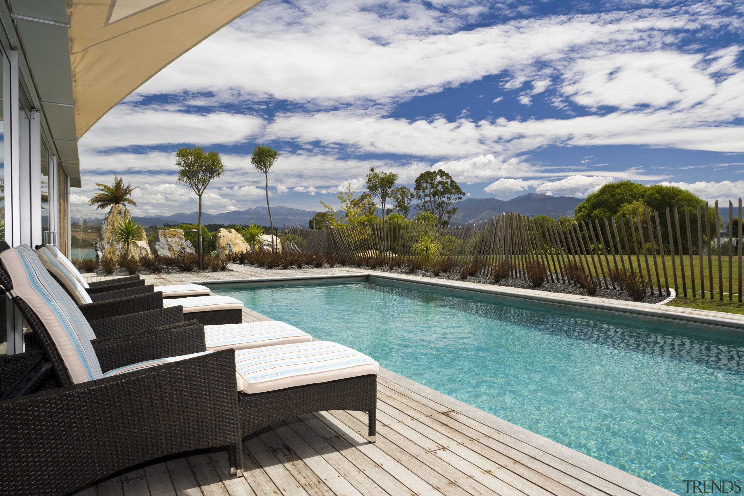 Exterior view of the outdoor area with pool, apartment, estate, home, house, leisure, outdoor furniture, penthouse apartment, property, real estate, resort, swimming pool, vacation, villa