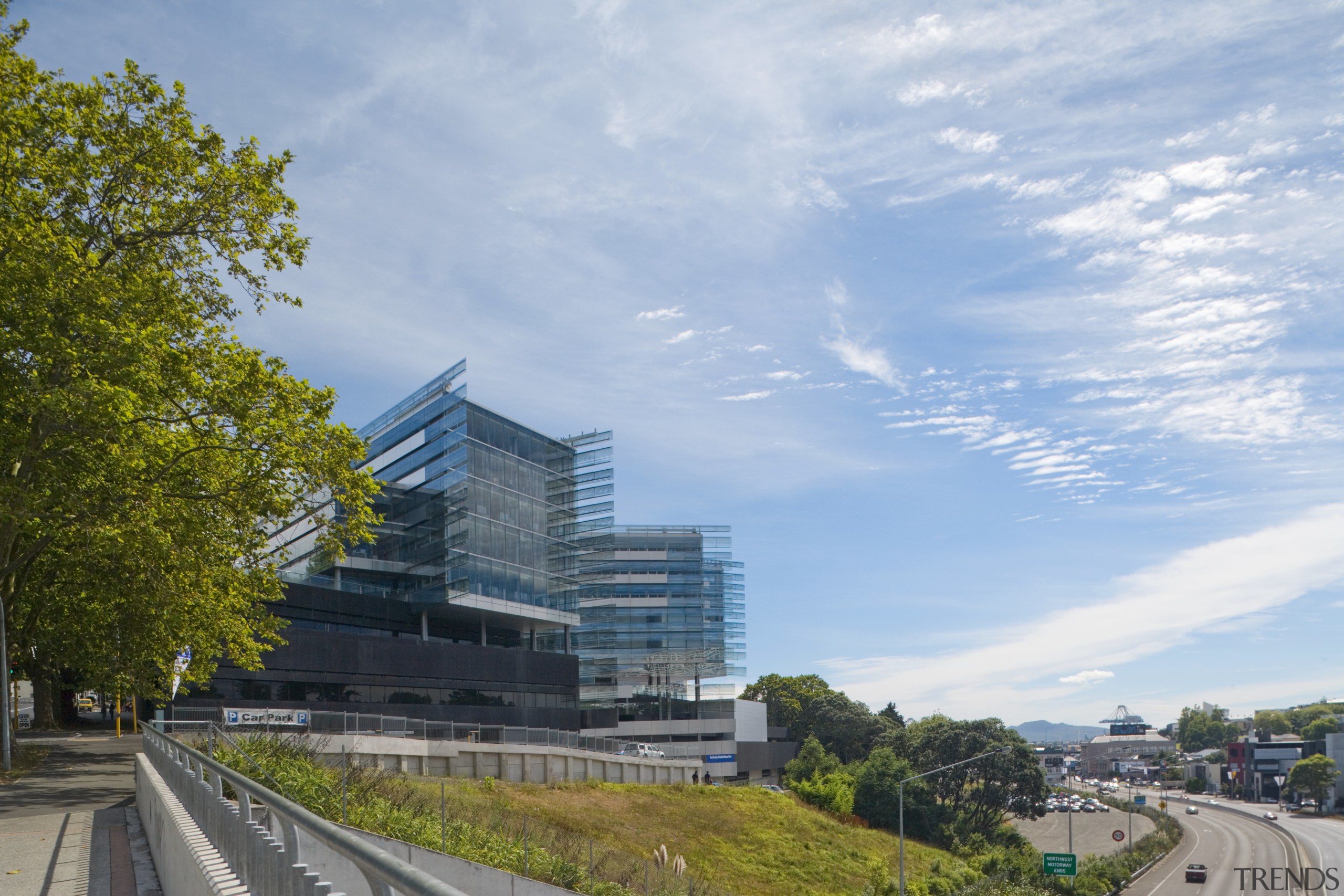 Thermosash and Woods Glass worked closley to create architecture, building, city, cloud, condominium, corporate headquarters, daytime, headquarters, house, metropolitan area, mixed use, real estate, residential area, sky, tower block, tree, gray