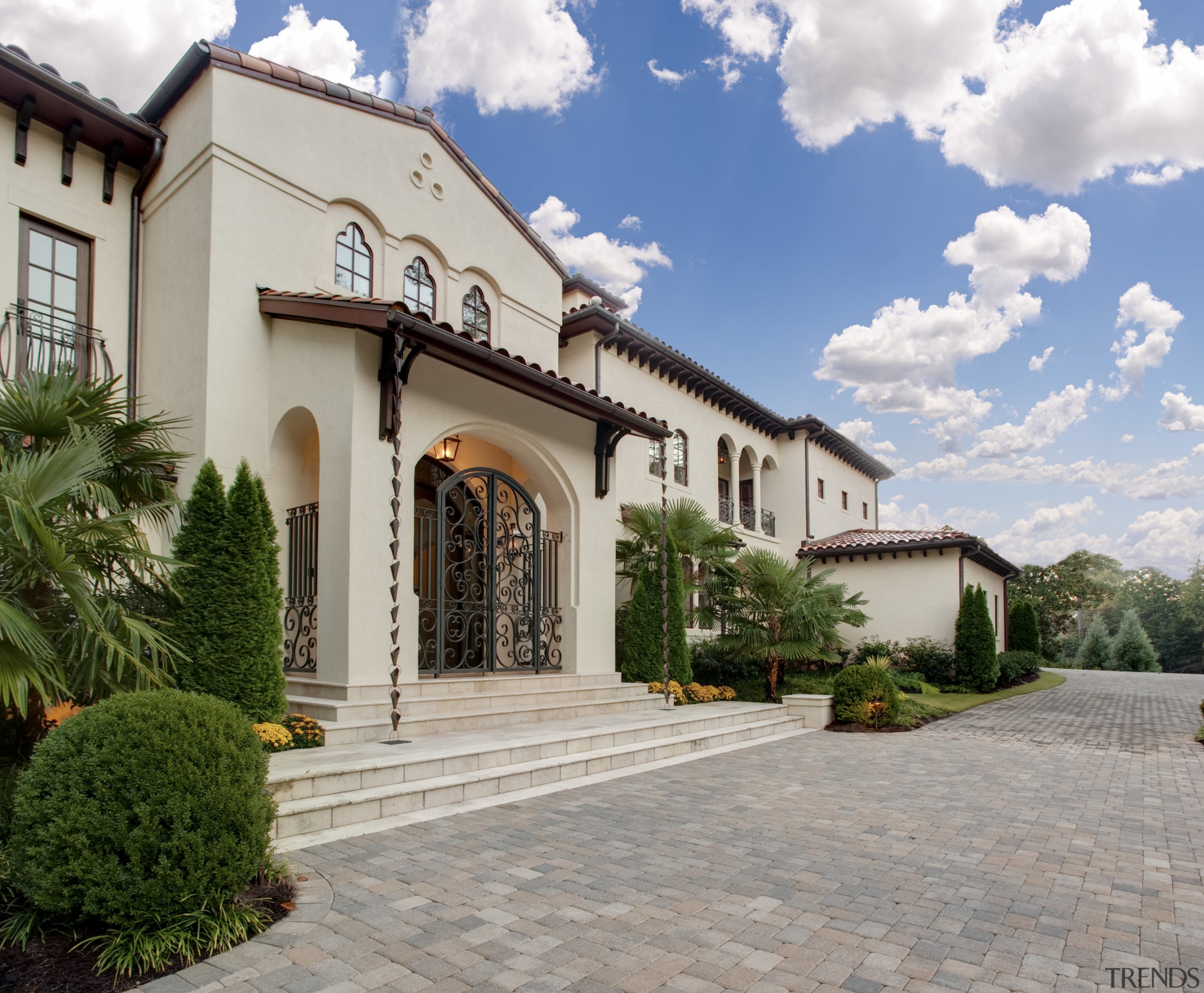 View of traditional home. - View of traditional building, estate, facade, hacienda, home, house, mansion, property, real estate, residential area, villa, gray