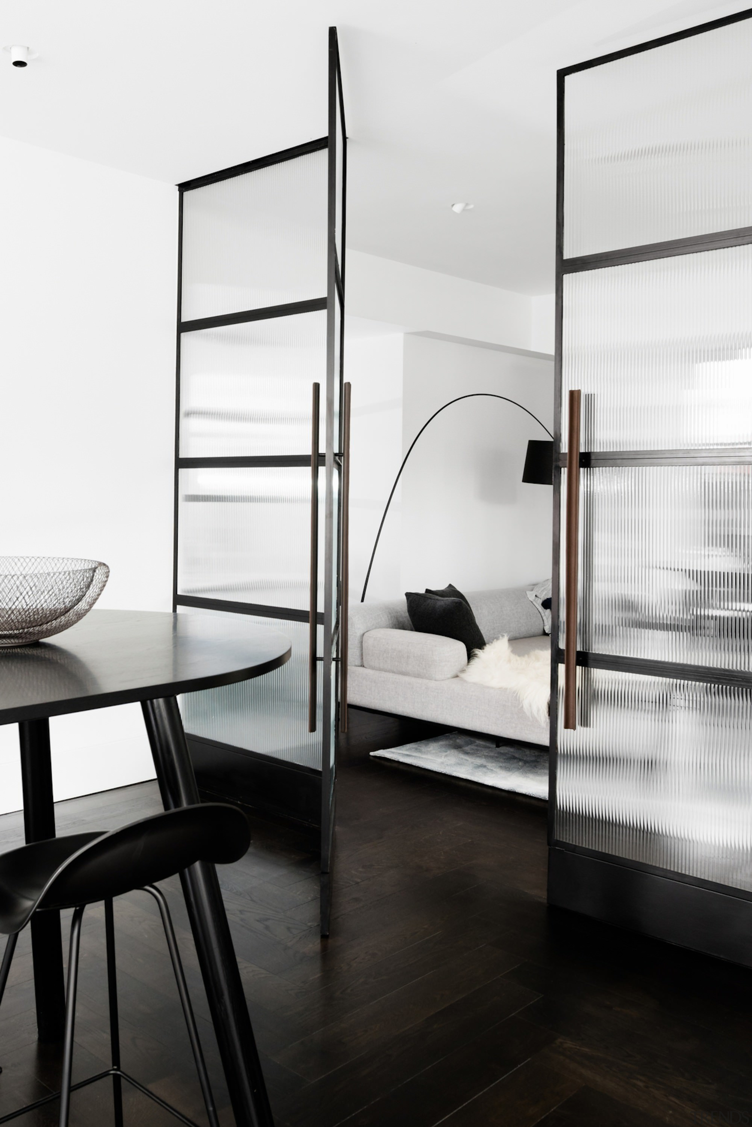 The doors separating the dining area from the black and white, floor, furniture, glass, interior design, product design, shelf, white, black