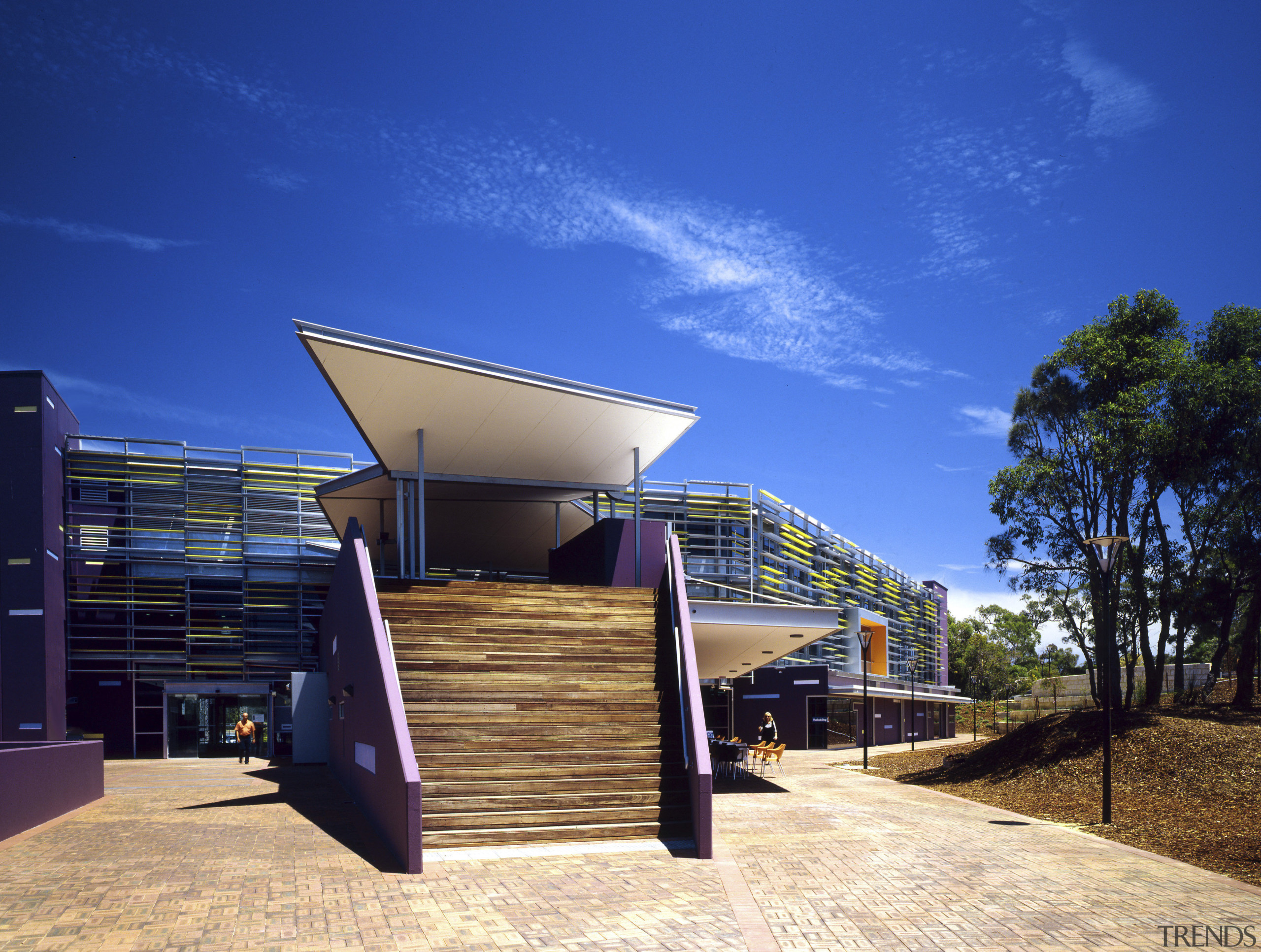 The strong goemetric lines of the entrance canopy architecture, estate, home, house, property, real estate, residential area, roof, sky, blue