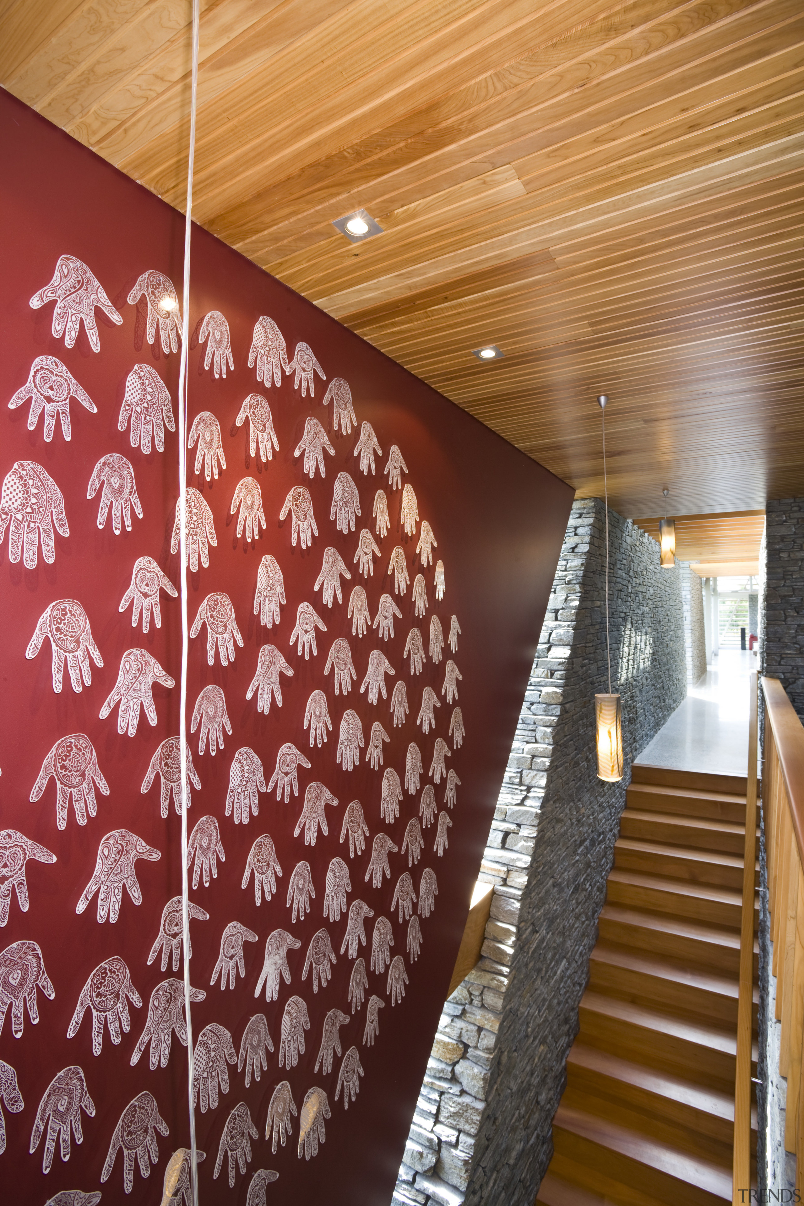 View of stairway lined with schist and artwork architecture, ceiling, daylighting, floor, flooring, interior design, stairs, wall, wood, red