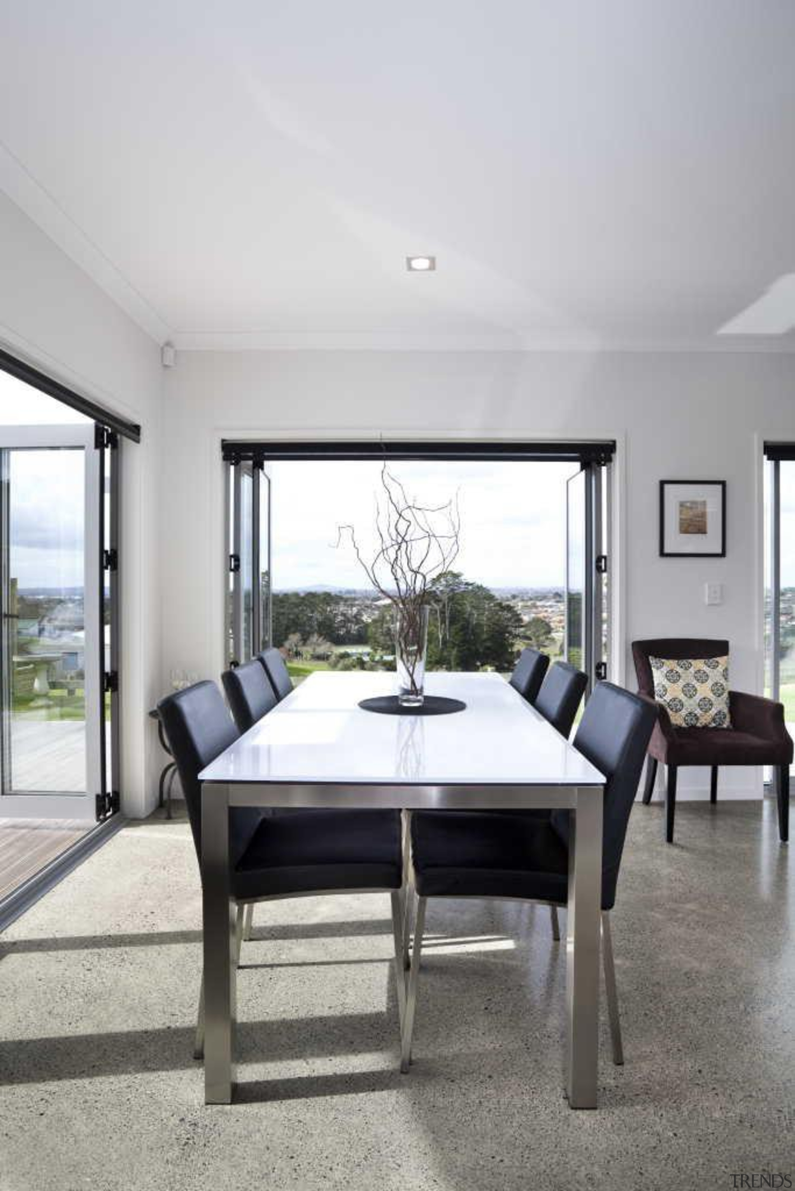 Dining room overseeing the city - White Interior floor, furniture, interior design, living room, real estate, table, window, gray