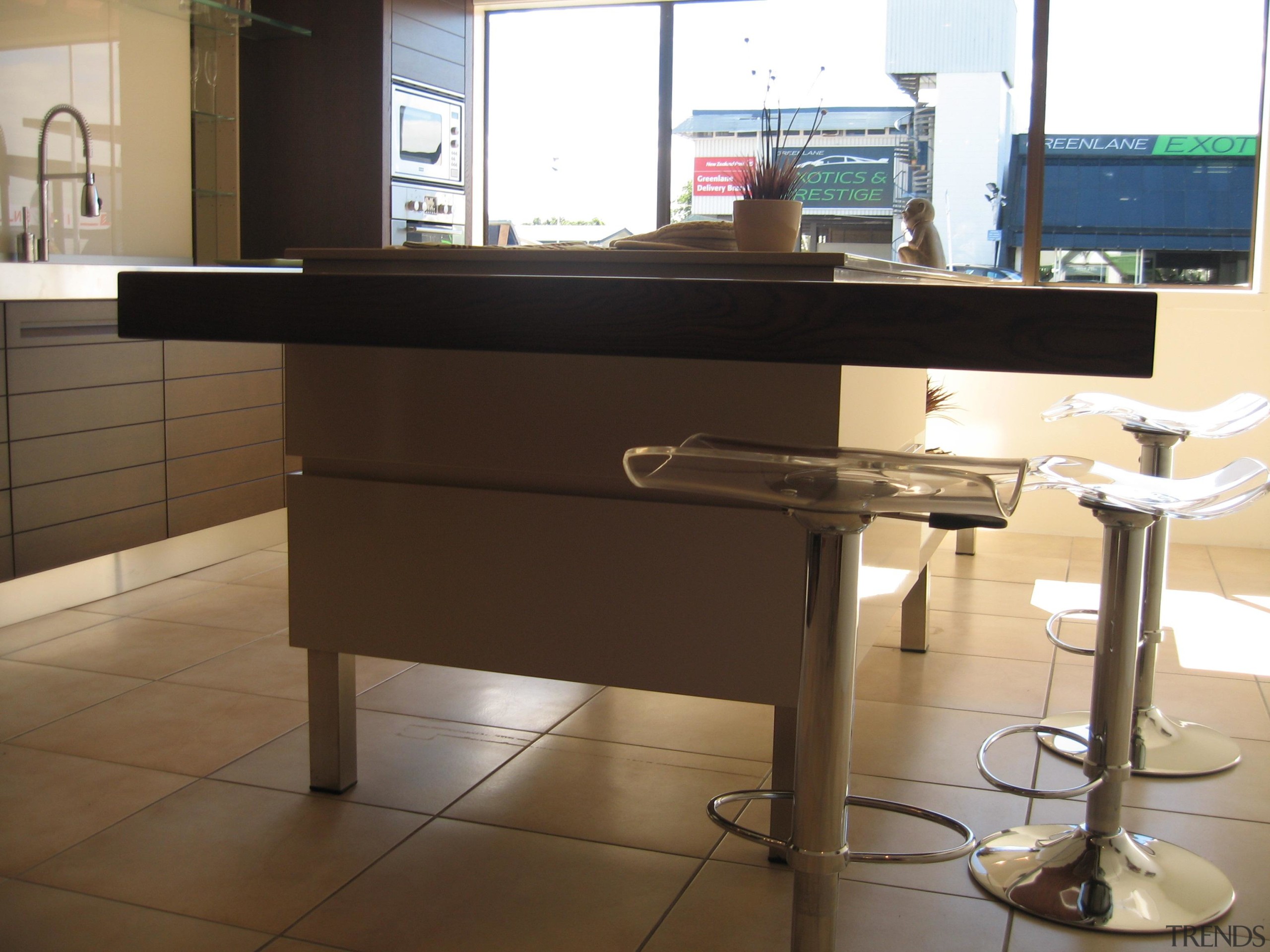 Greenlane - countertop | desk | floor | countertop, desk, floor, flooring, furniture, kitchen, table, black, brown