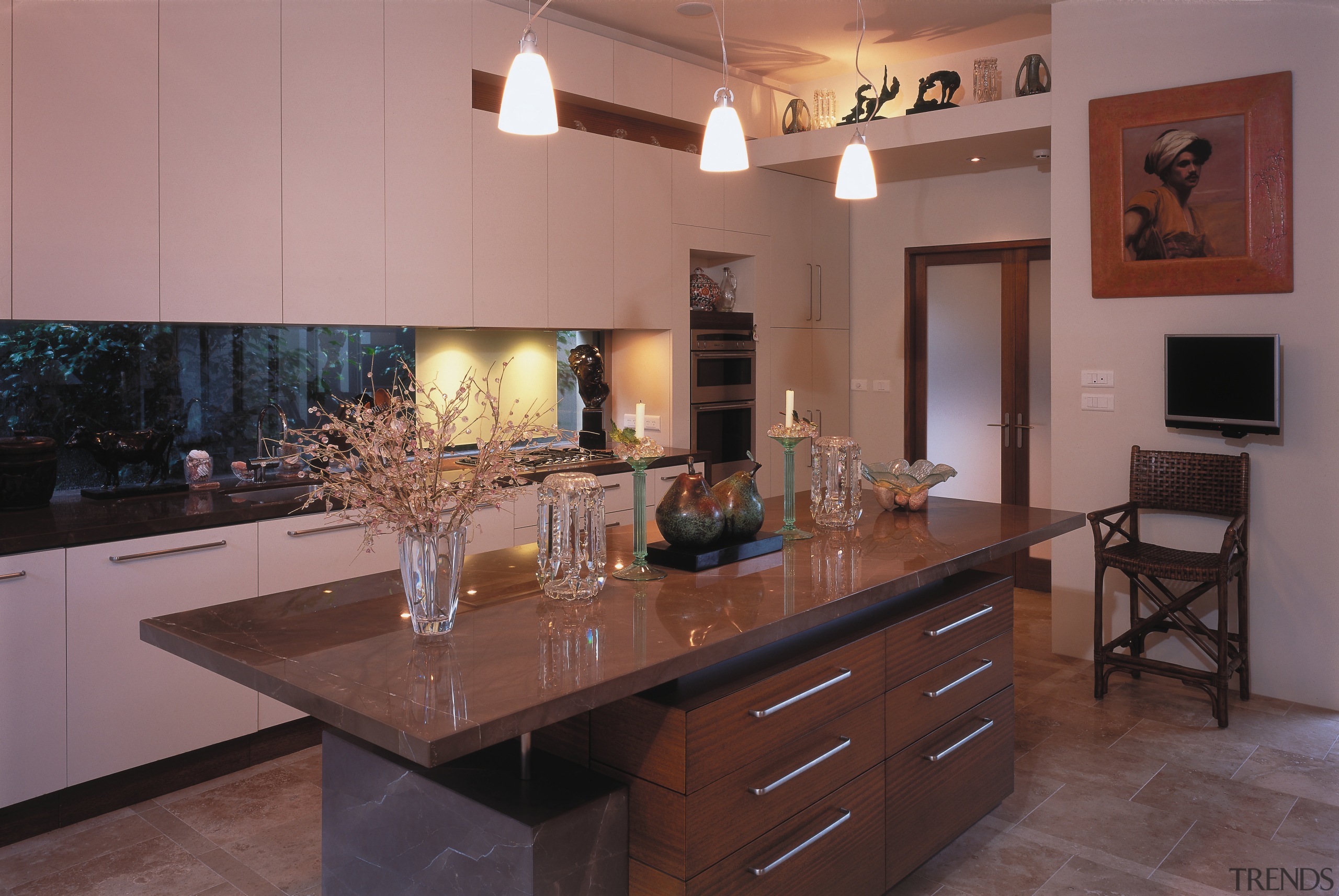 view of the kitchen featuring tiled flooring, stainless cabinetry, countertop, cuisine classique, flooring, home, interior design, kitchen, real estate, room, table, red, black