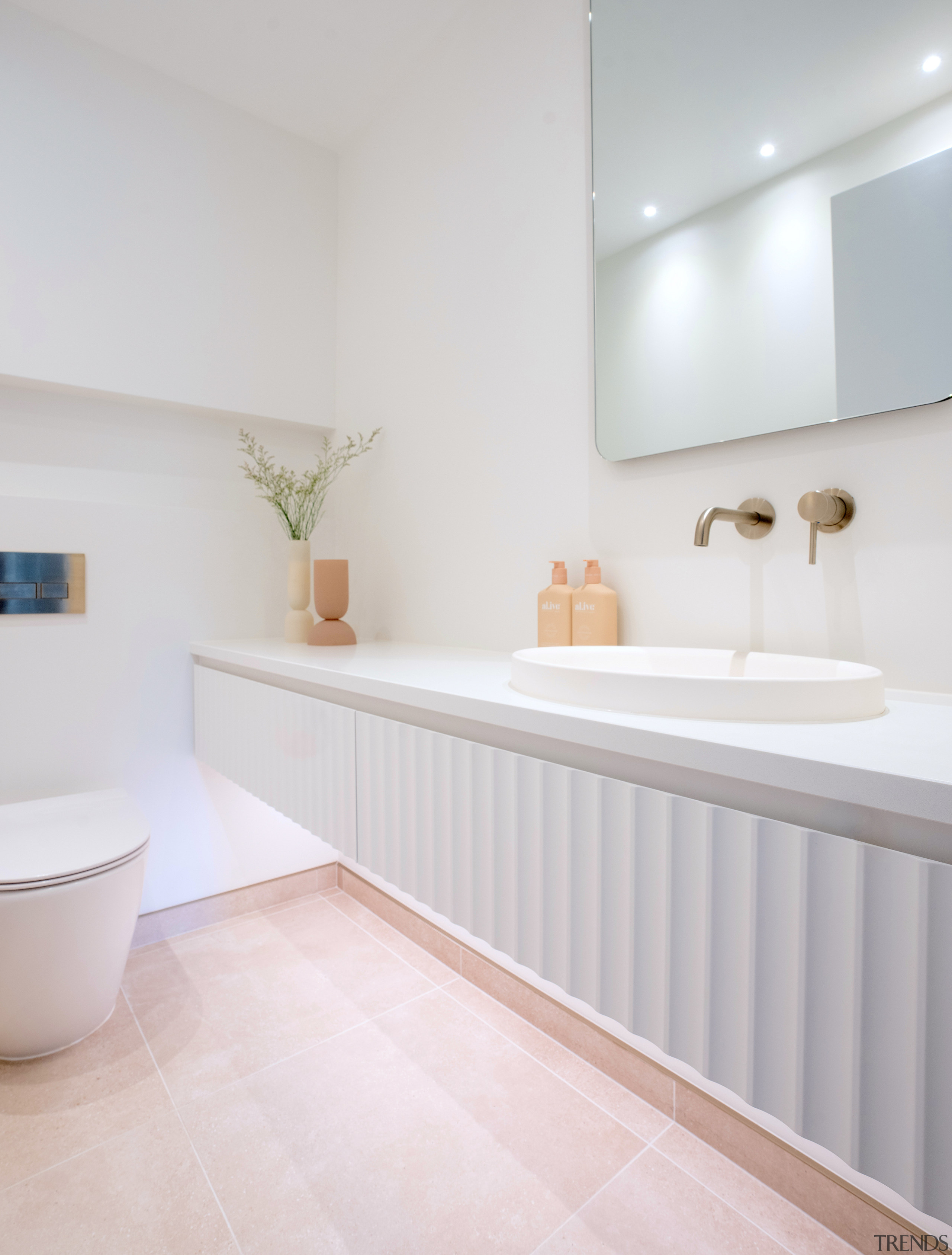 Each vanity now stretches wall to wall, maximising 